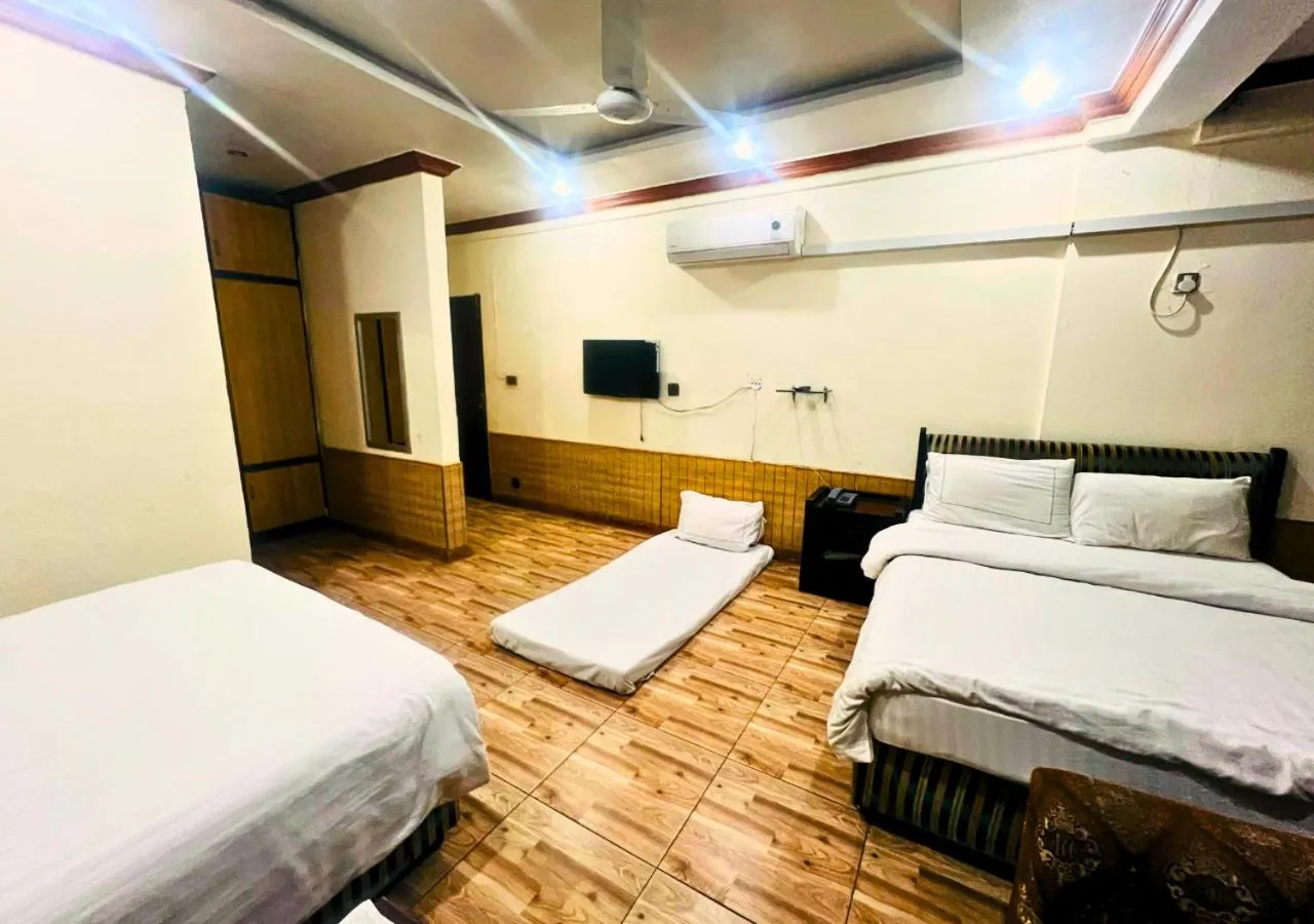 Bed in New Islamabad Hotel