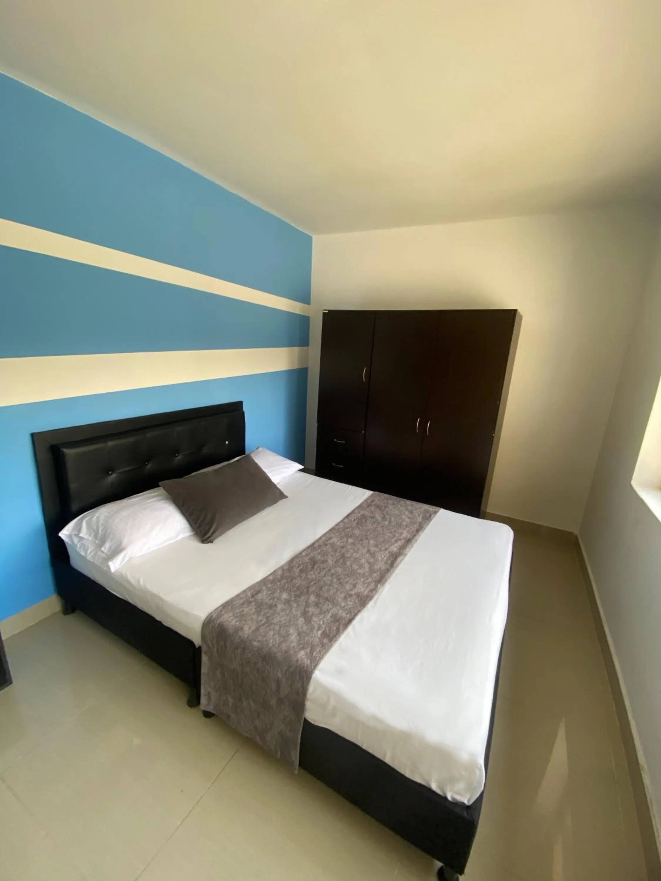 Bed in 33 Hotel Bulerias