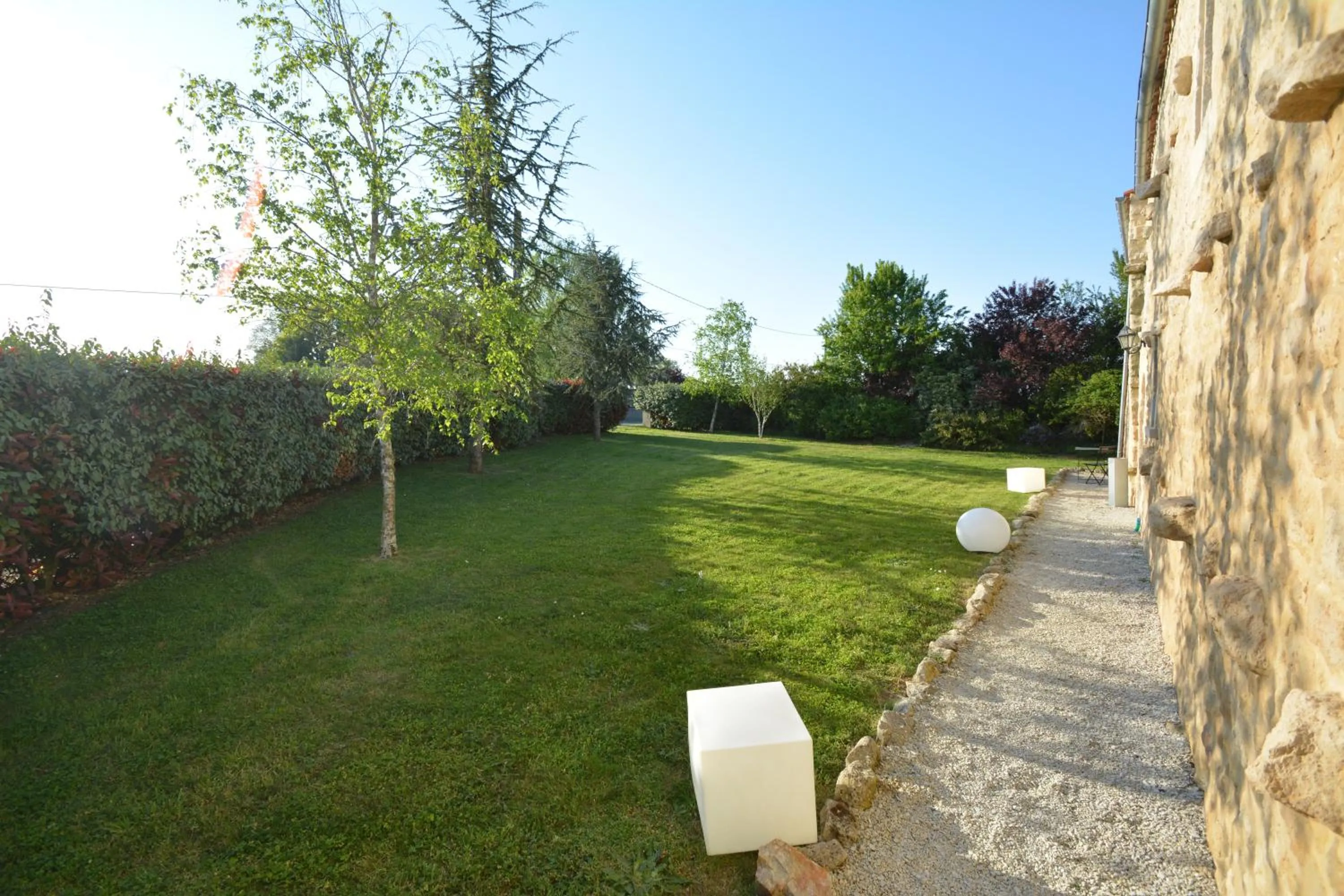 Garden view in Aux 4 Cornes - Chambre d'hôtes