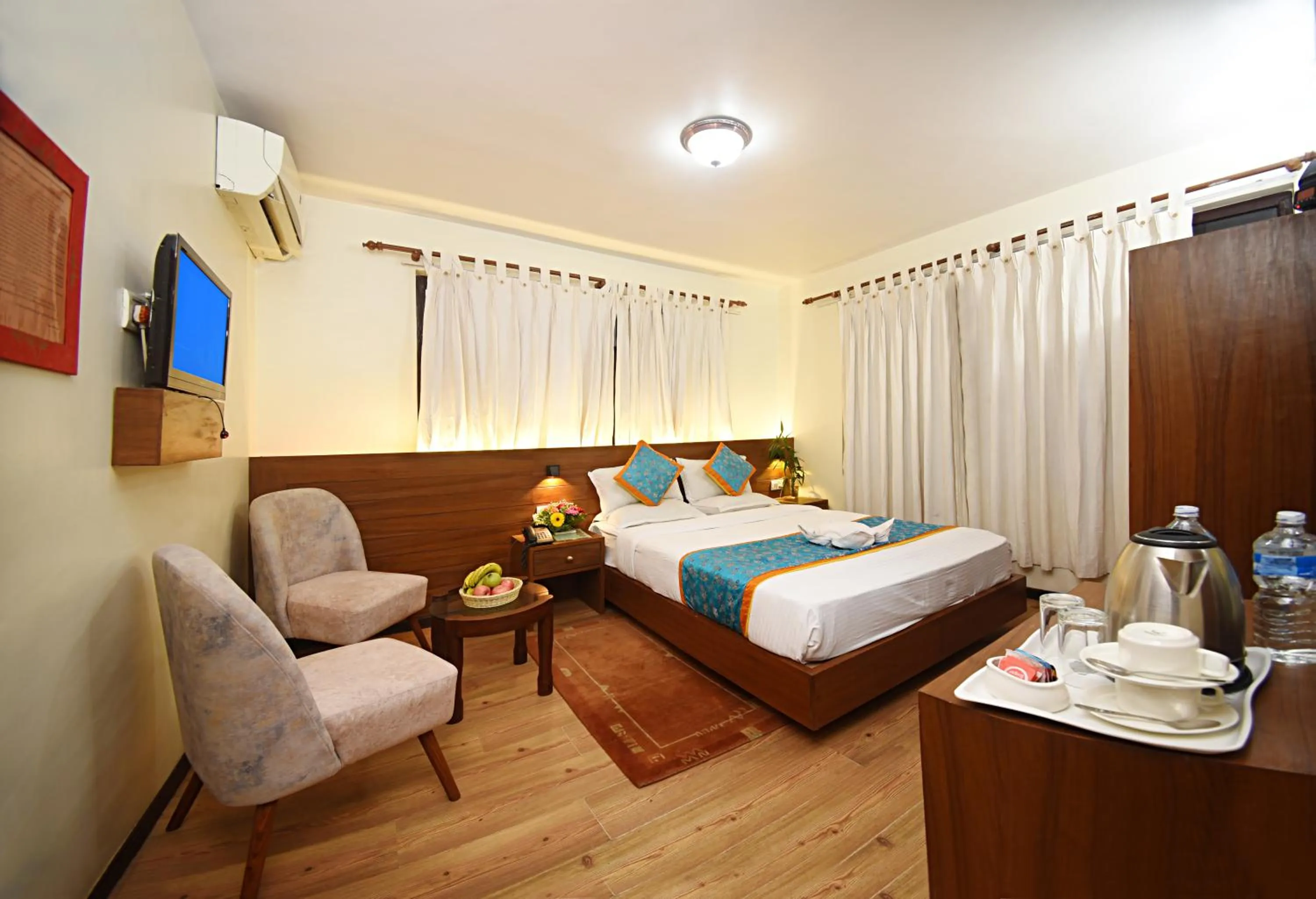 TV and multimedia, Bed in Hotel Amaryllis Kathmandu