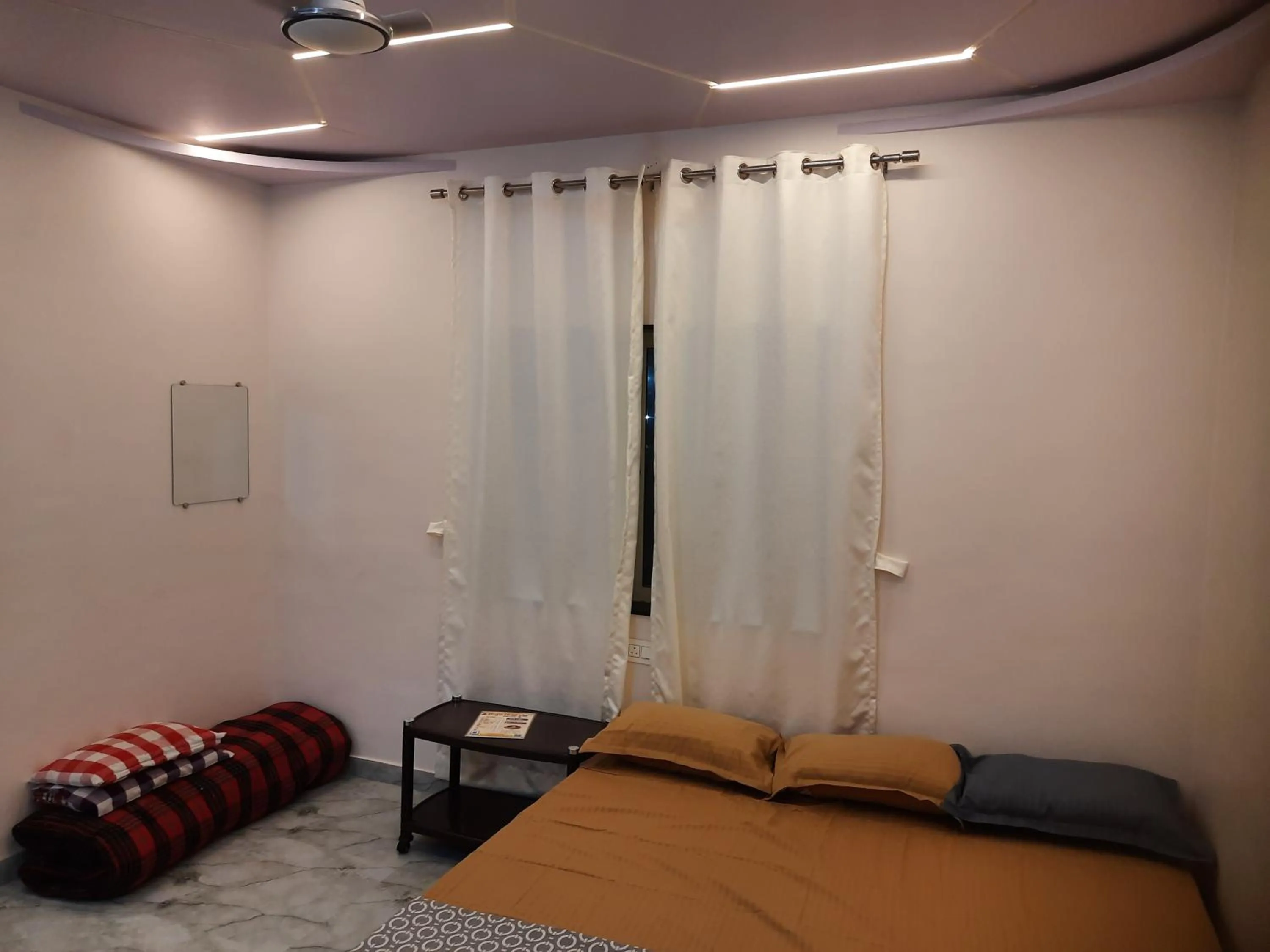 Bed in Shriguru Guest House Akkalkot