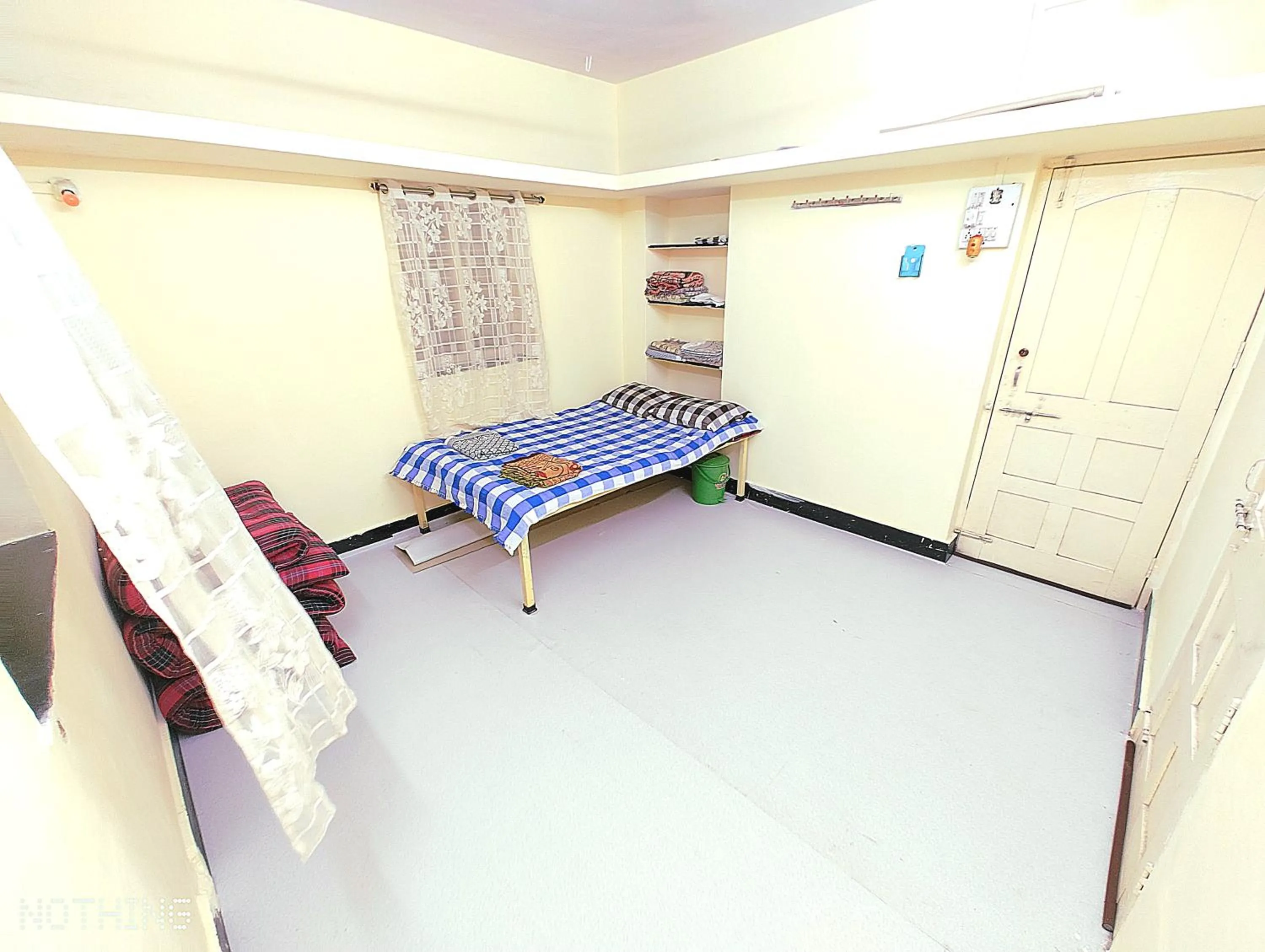 Bed in Shriguru Guest House Akkalkot