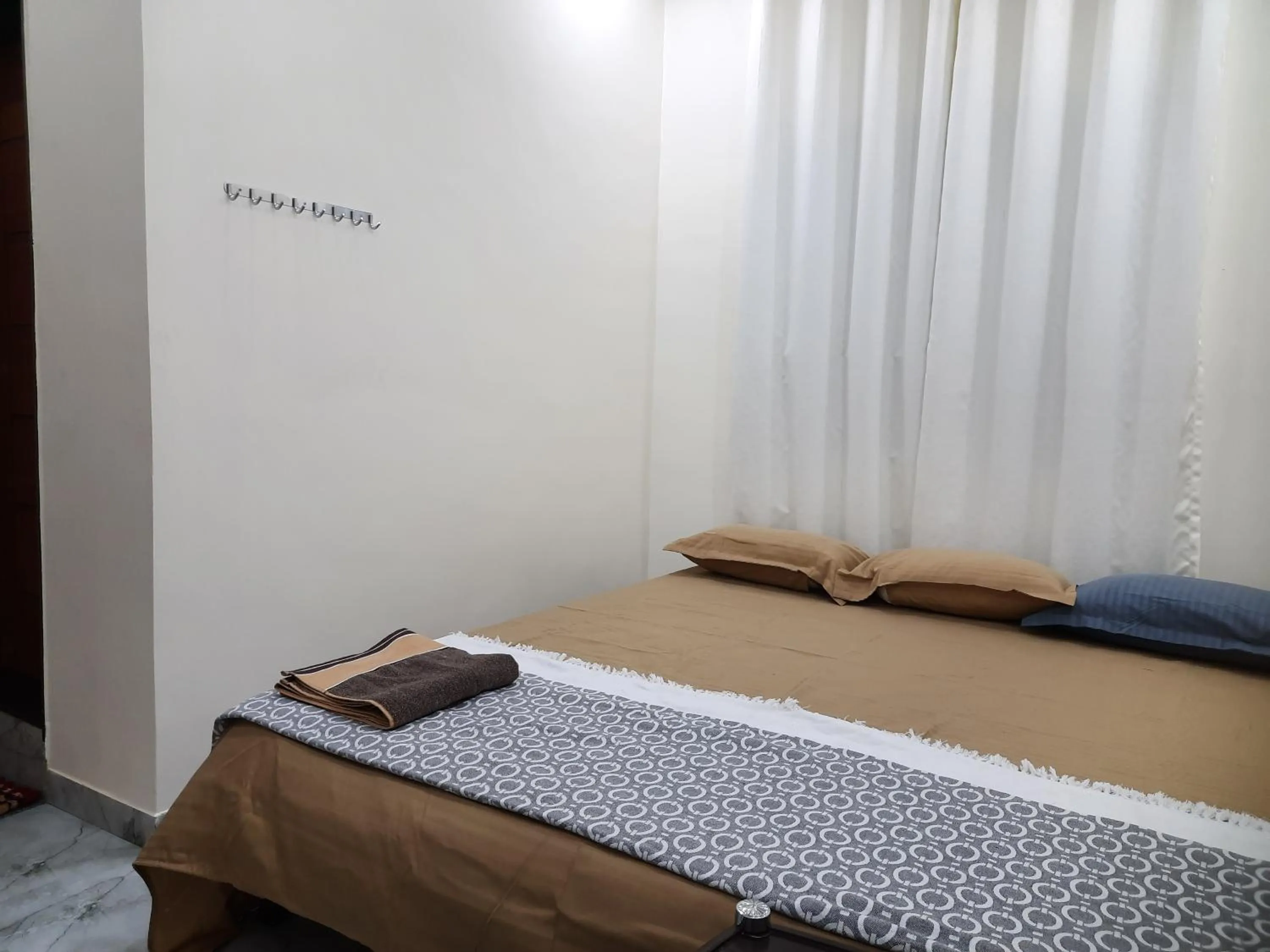 Bed in Shriguru Guest House Akkalkot