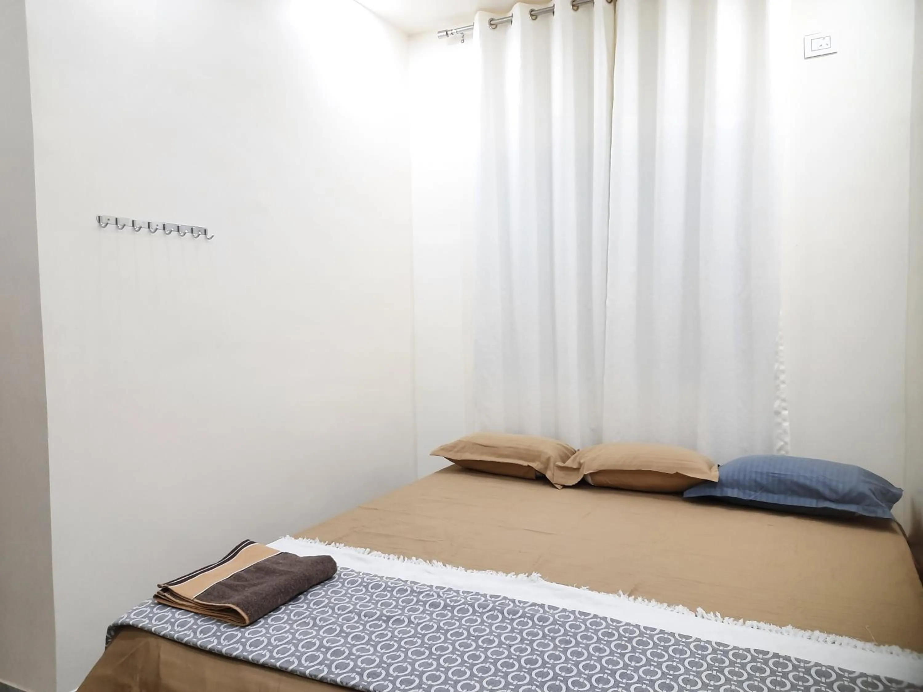 Bed in Shriguru Guest House Akkalkot