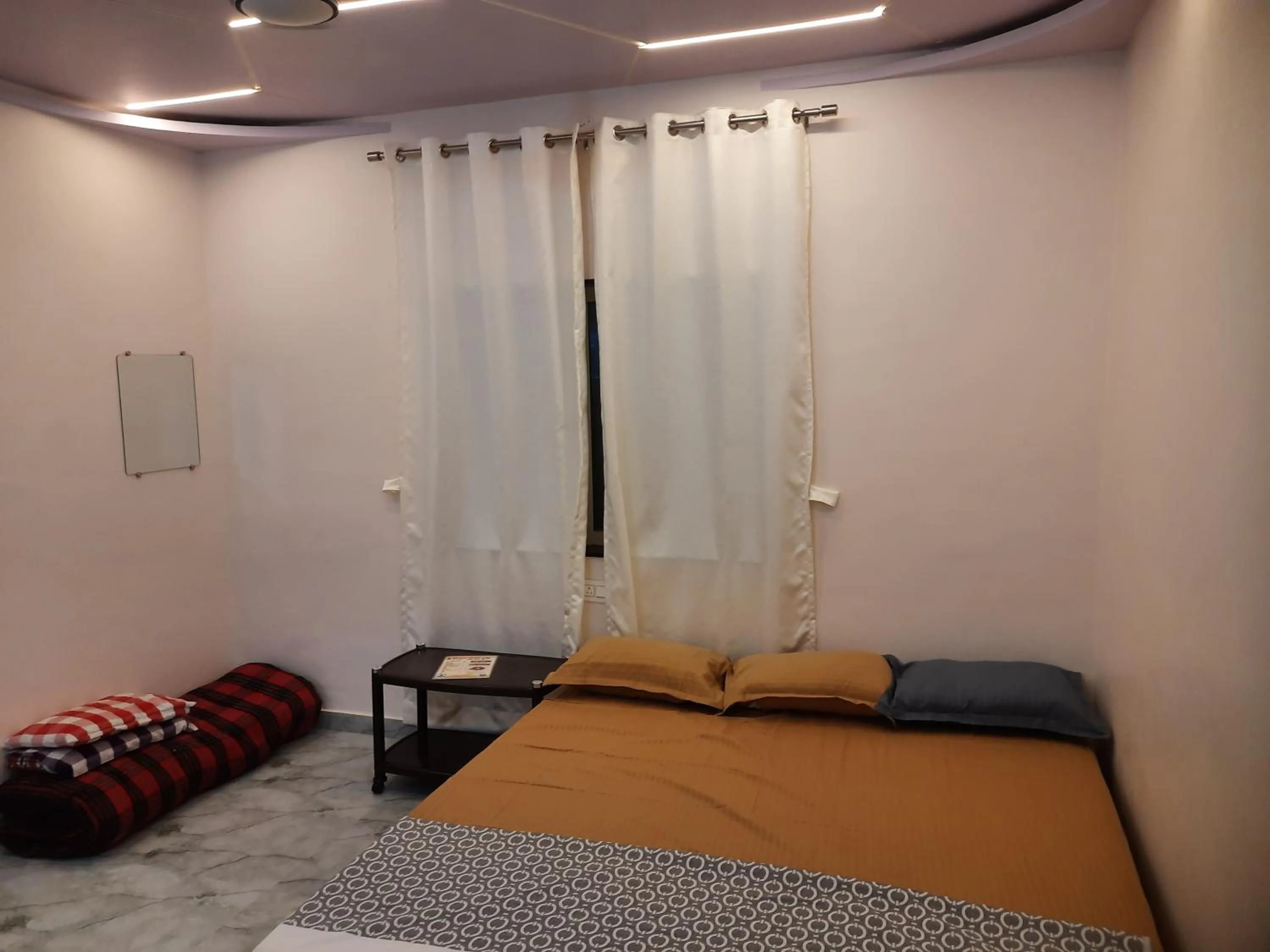 Bed in Shriguru Guest House Akkalkot