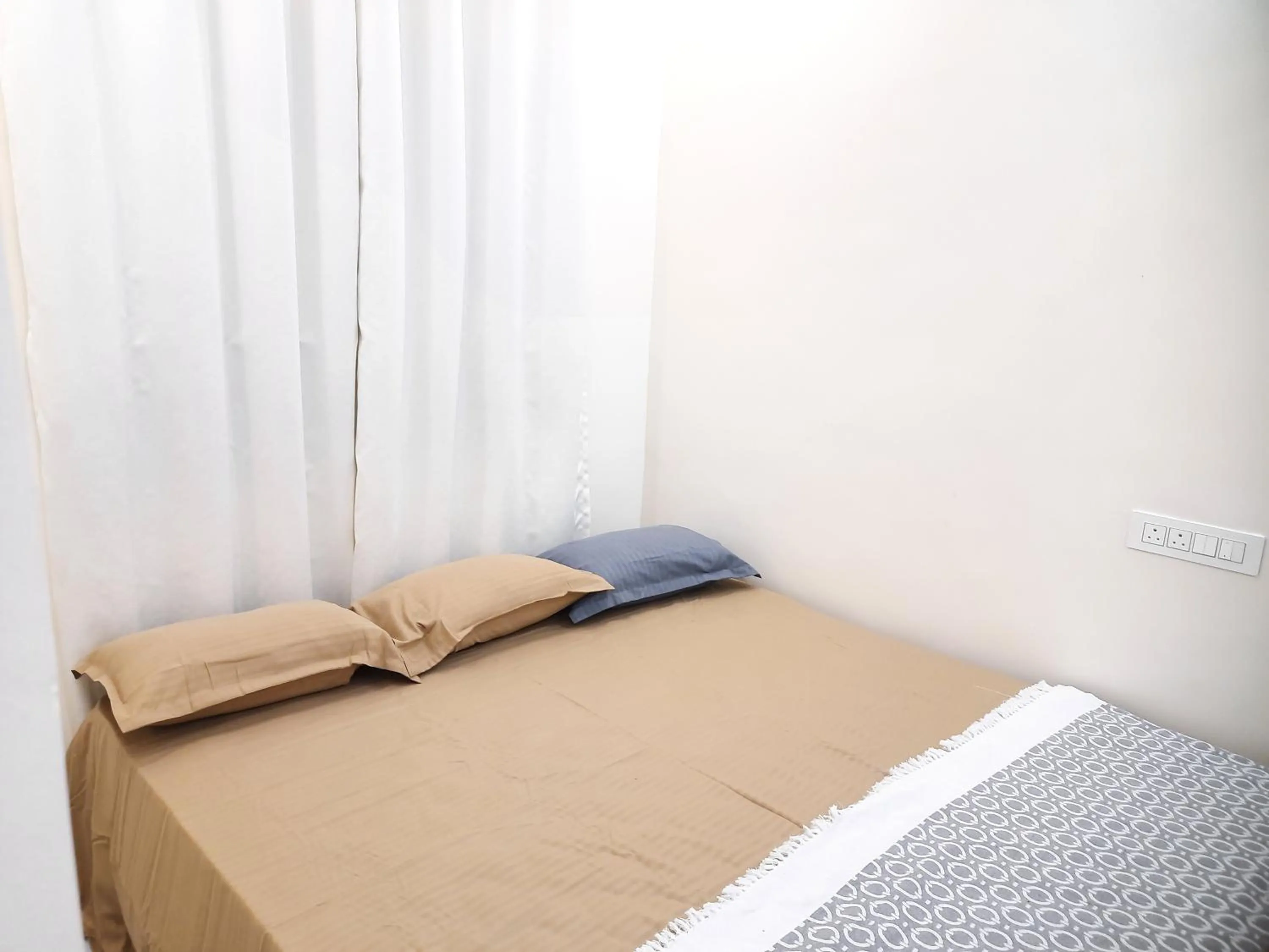 Bed in Shriguru Guest House Akkalkot