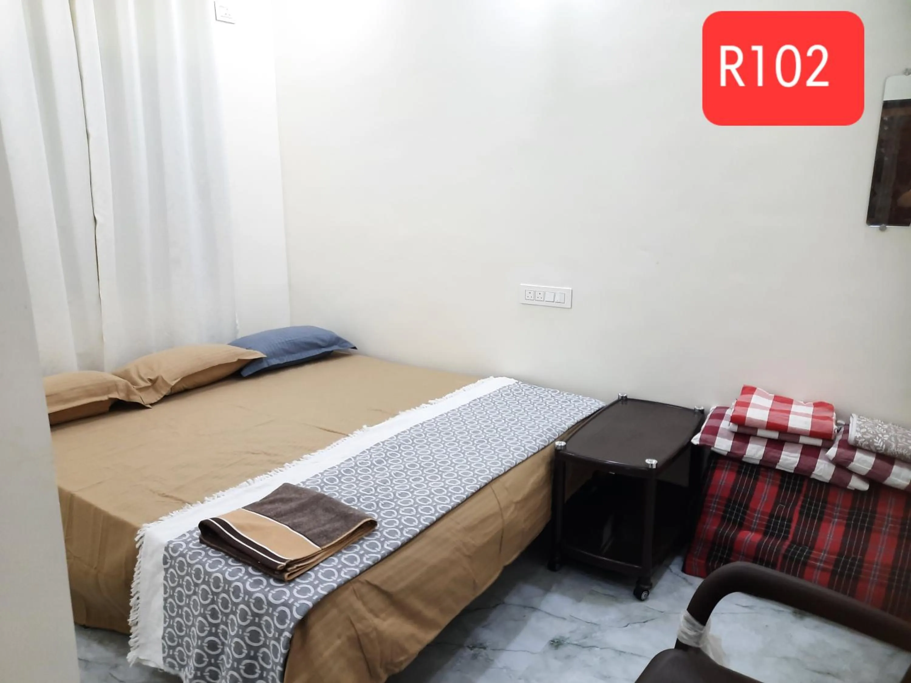 Bed in Shriguru Guest House Akkalkot