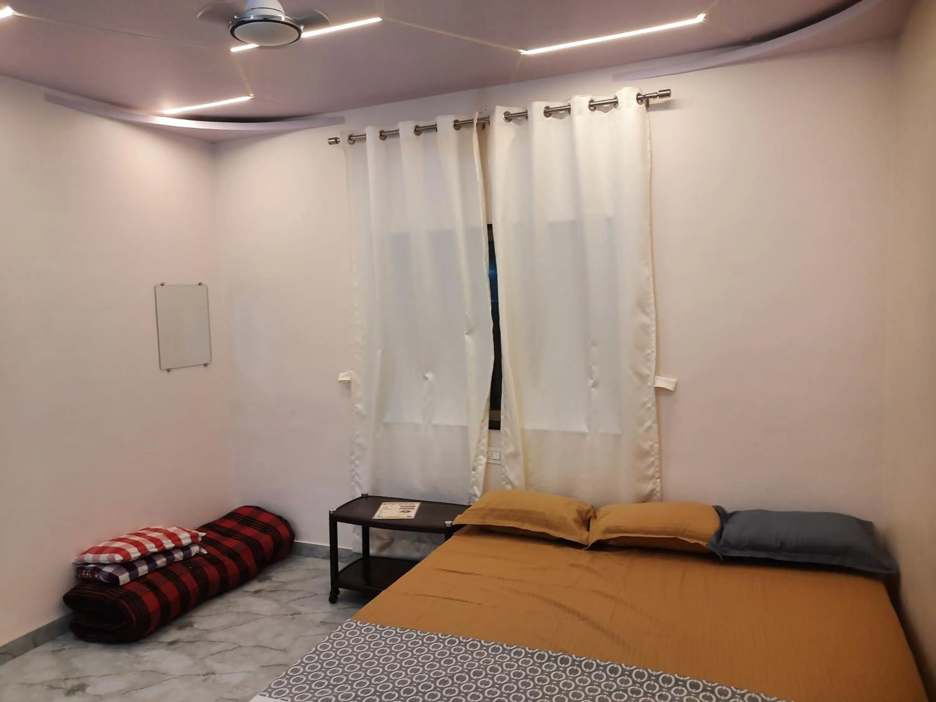 Bed in Shriguru Guest House Akkalkot