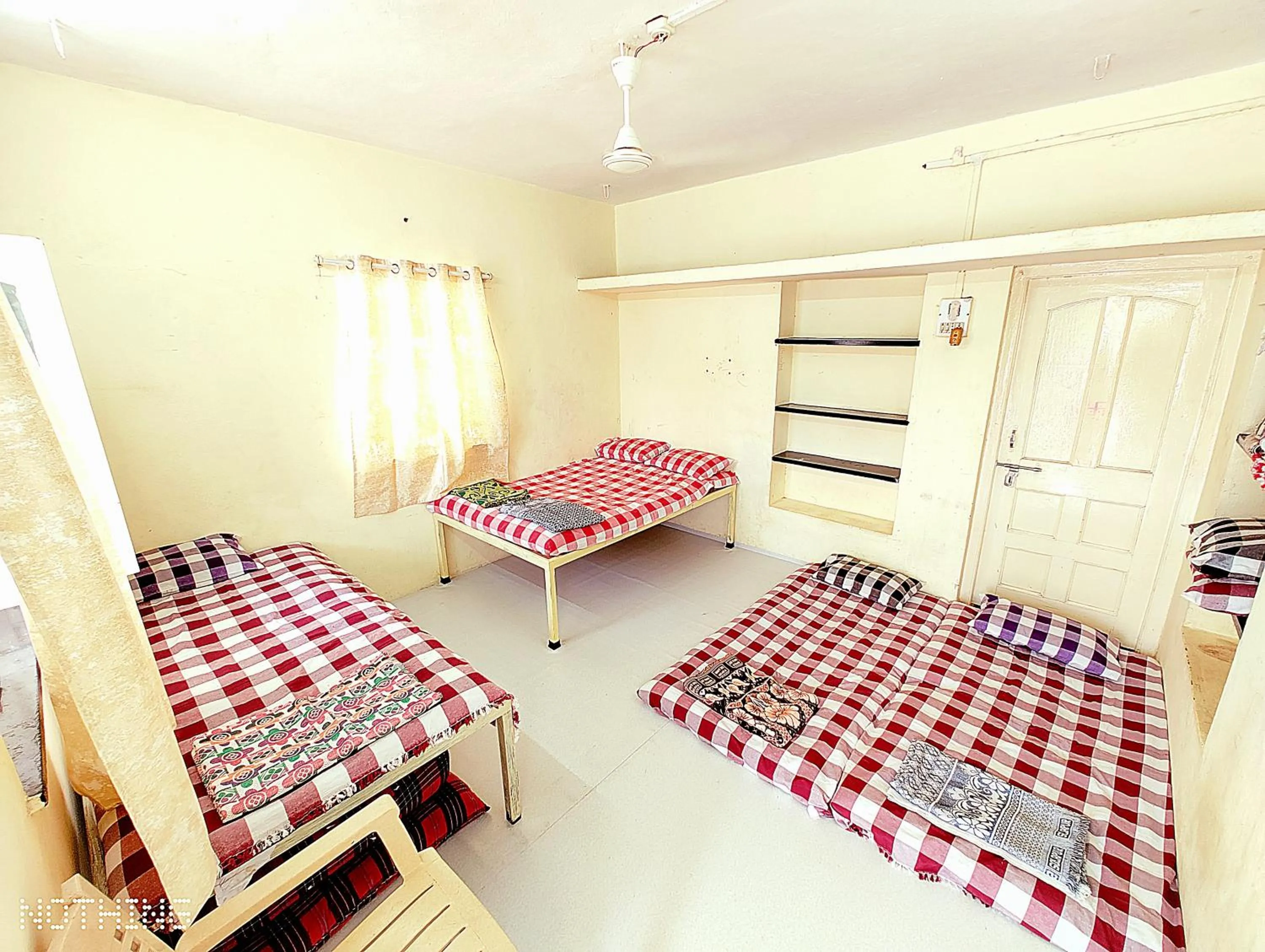 Bed in Shriguru Guest House Akkalkot