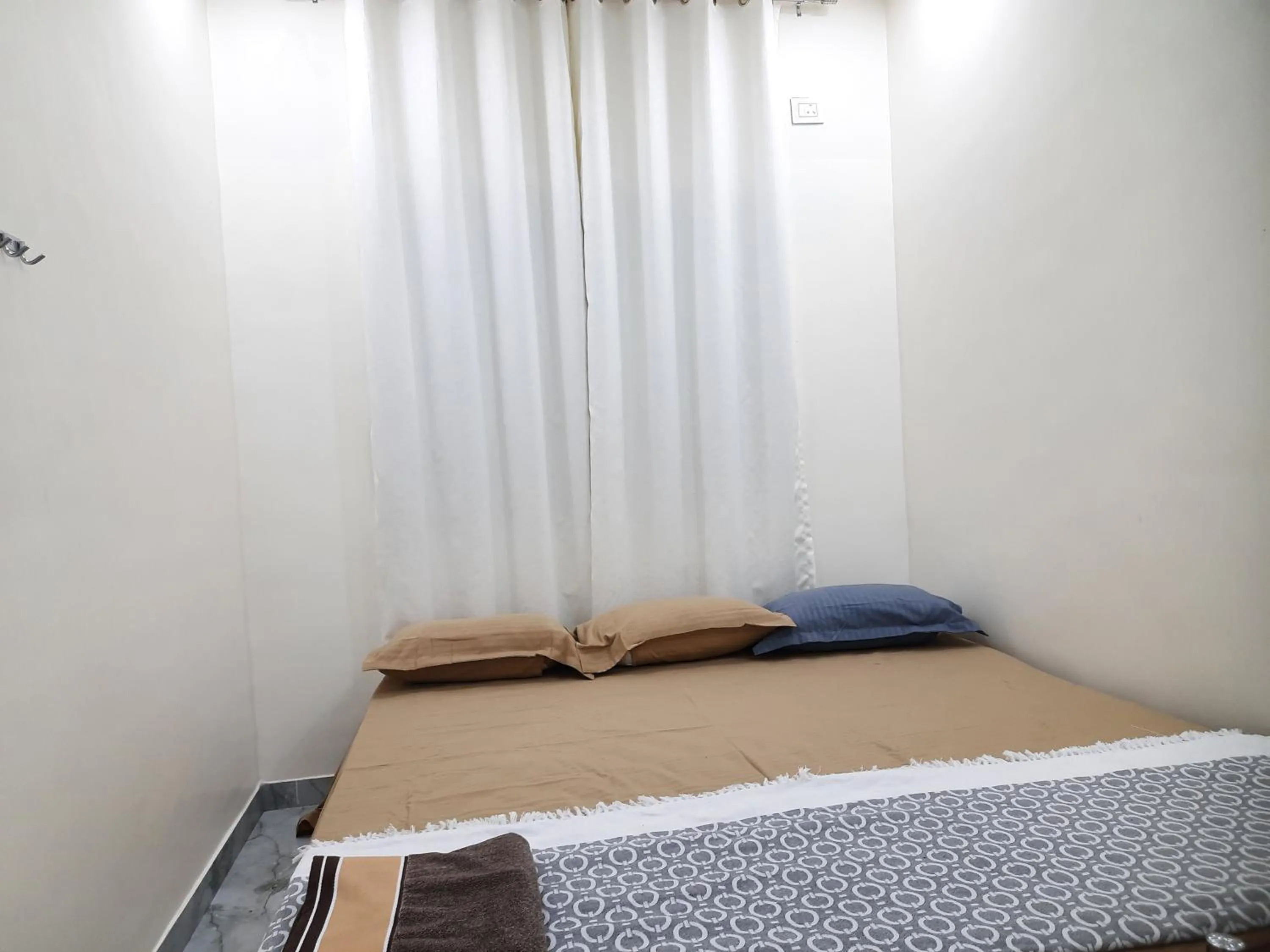 Bed in Shriguru Guest House Akkalkot