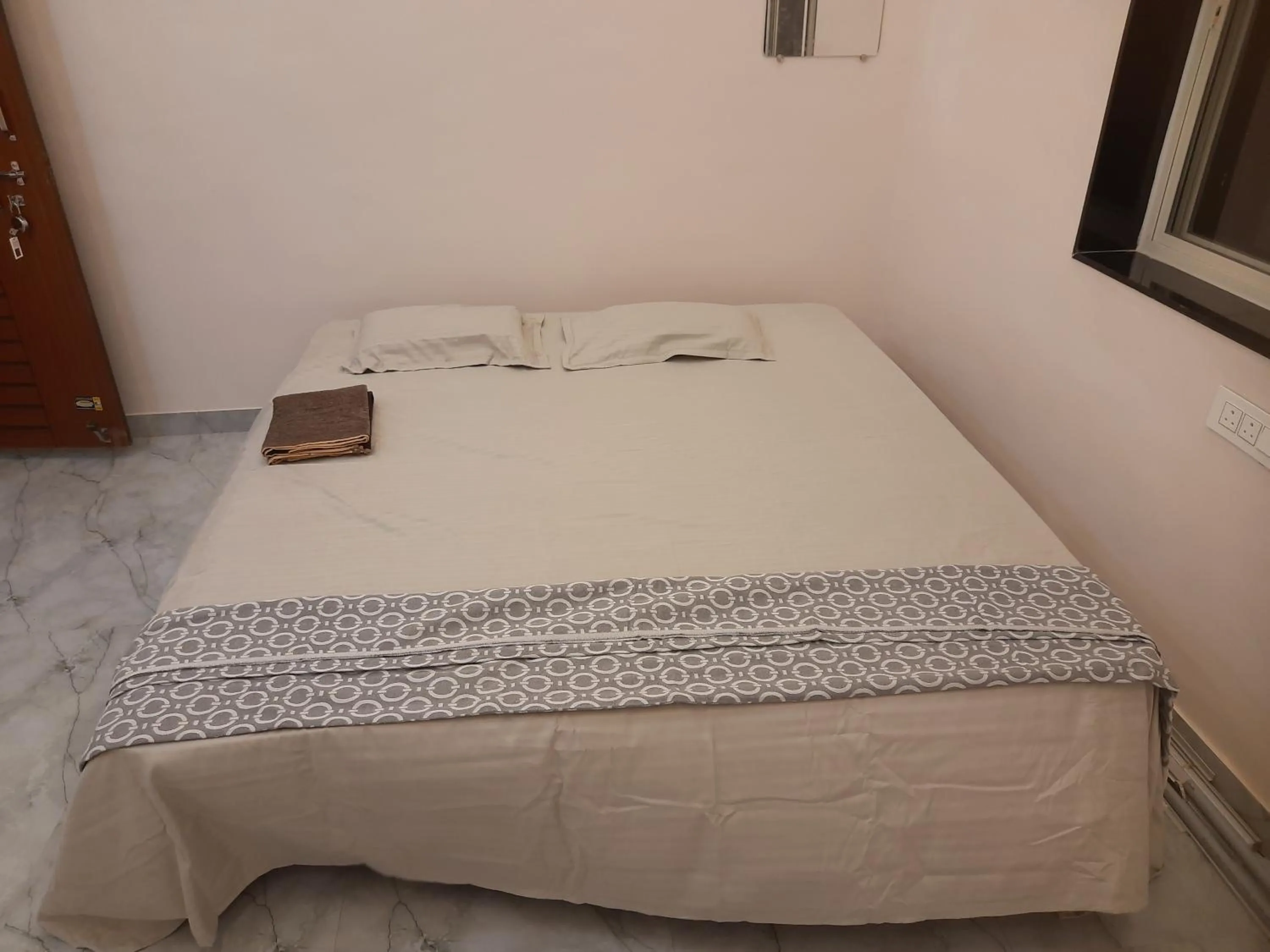 Bed in Shriguru Guest House Akkalkot