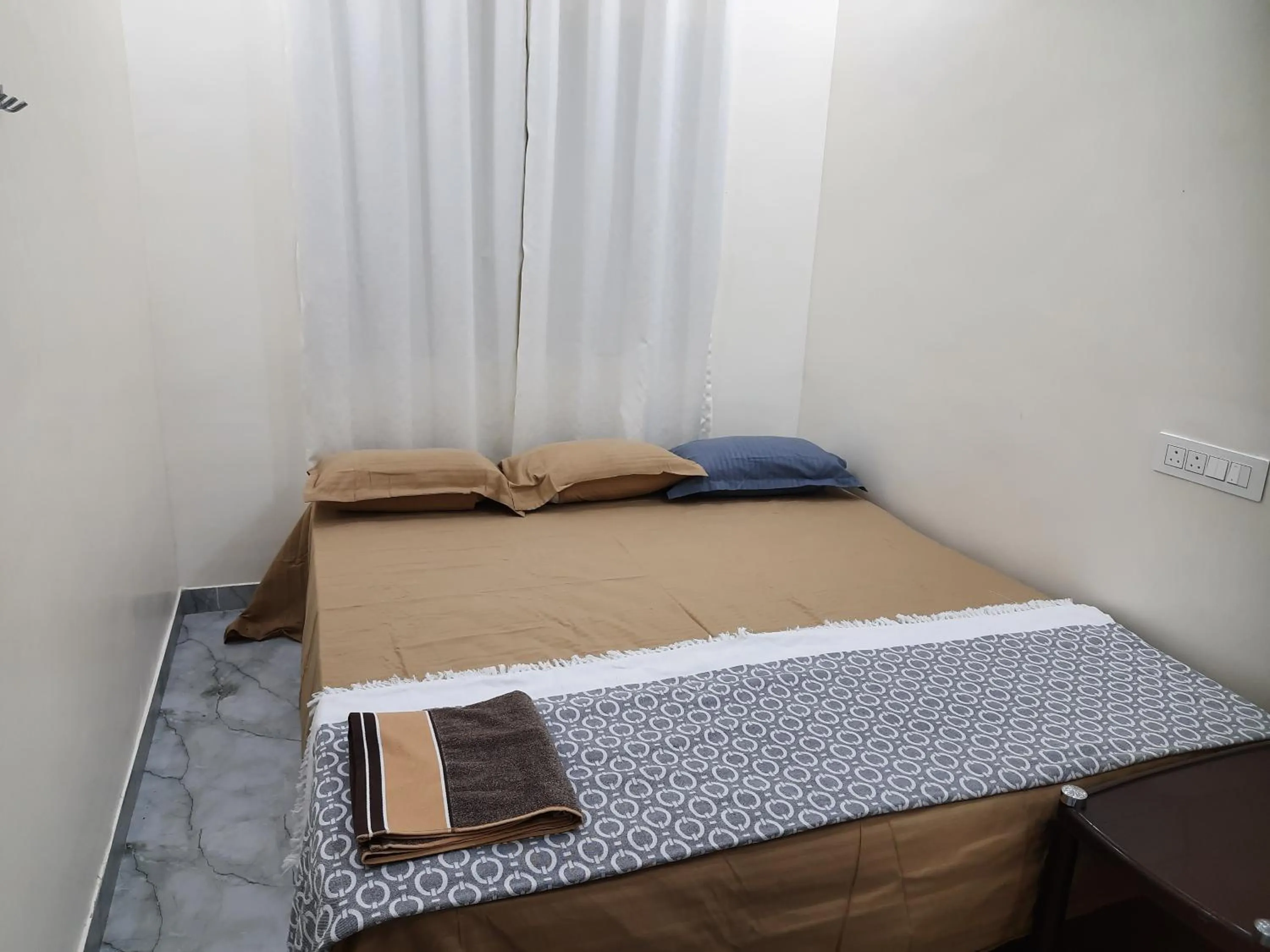 Bed in Shriguru Guest House Akkalkot