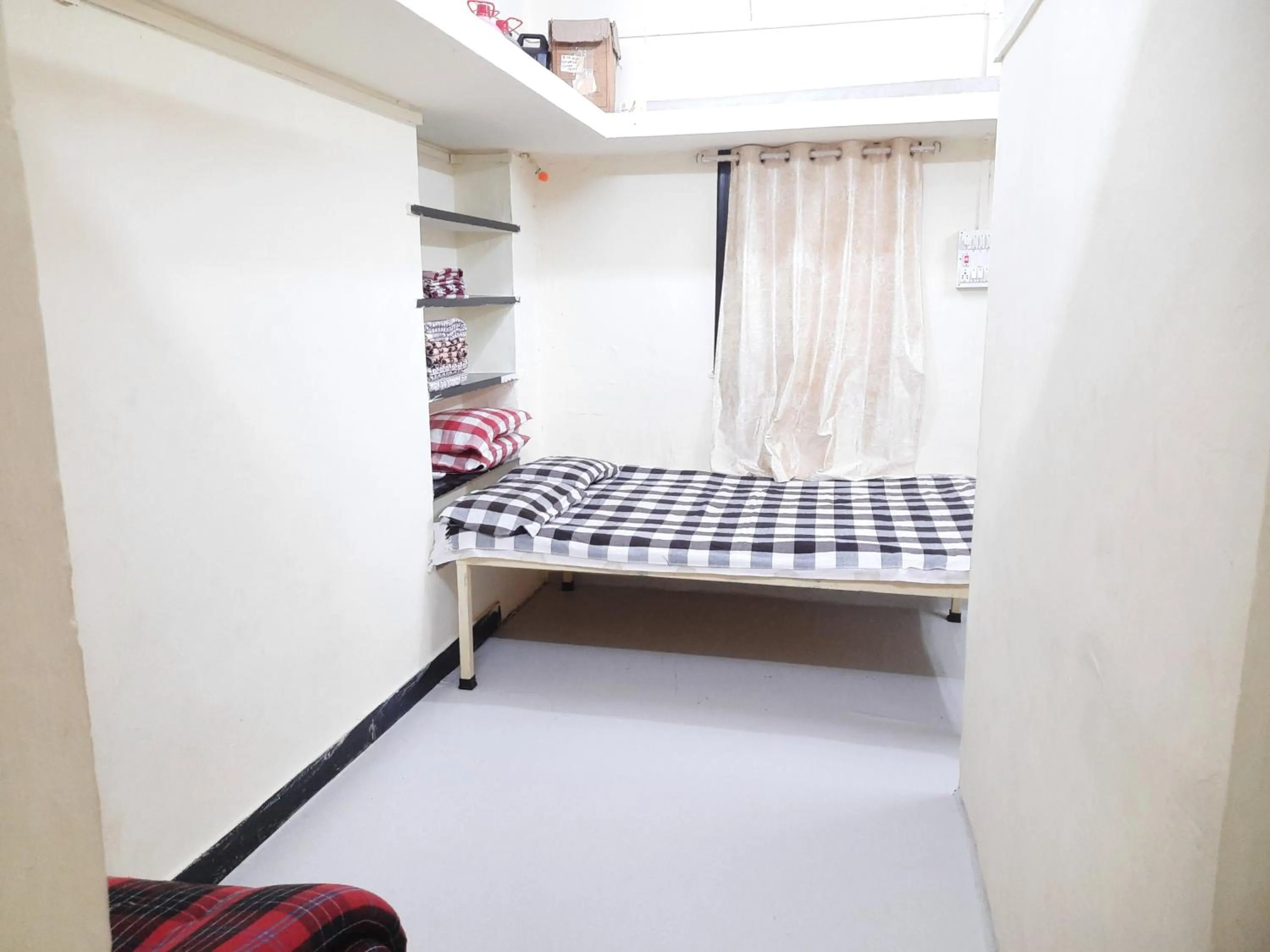 Bed in Shriguru Guest House Akkalkot