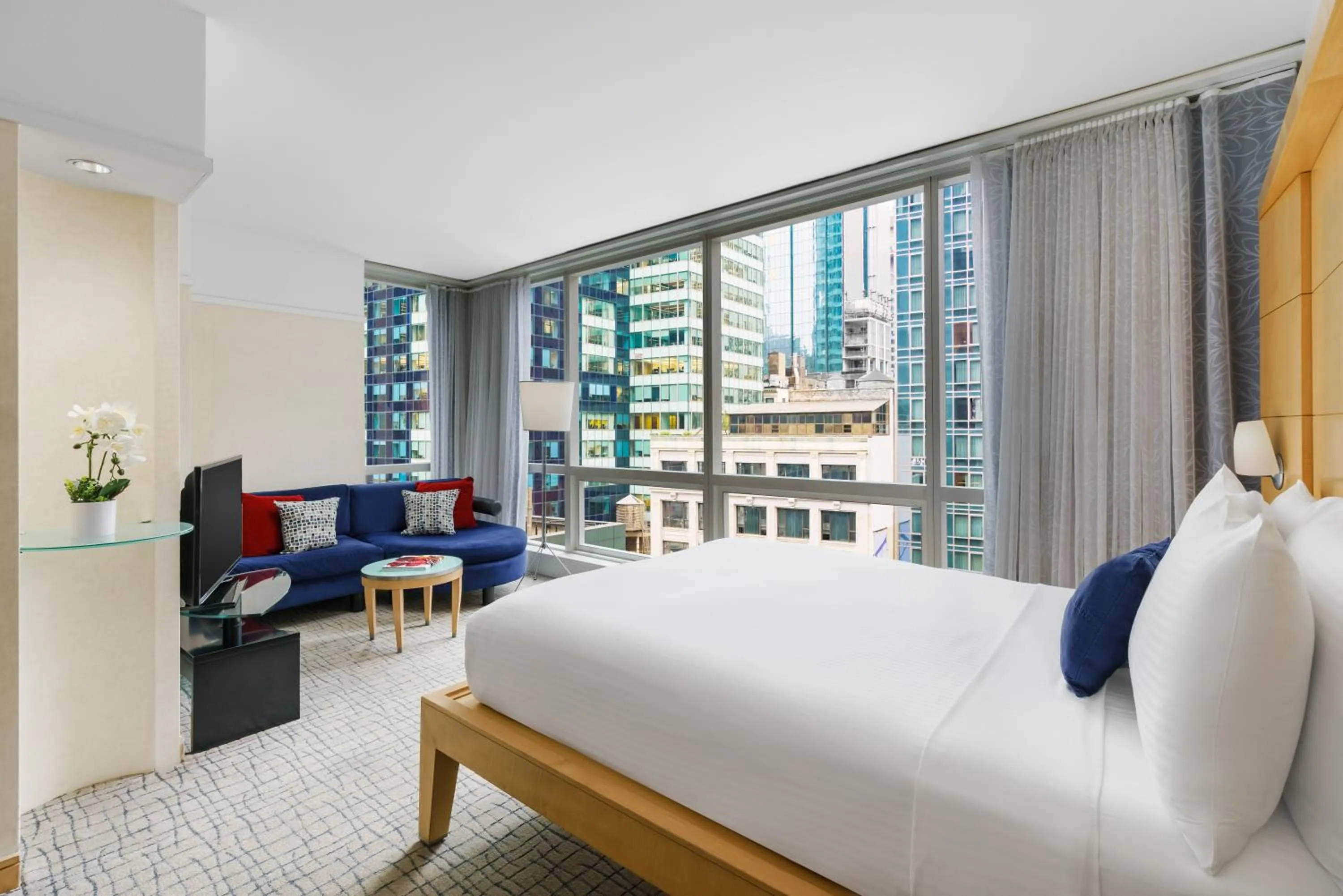 Photo of the whole room, Bed in Millennium Premier Hotel New York Times Square