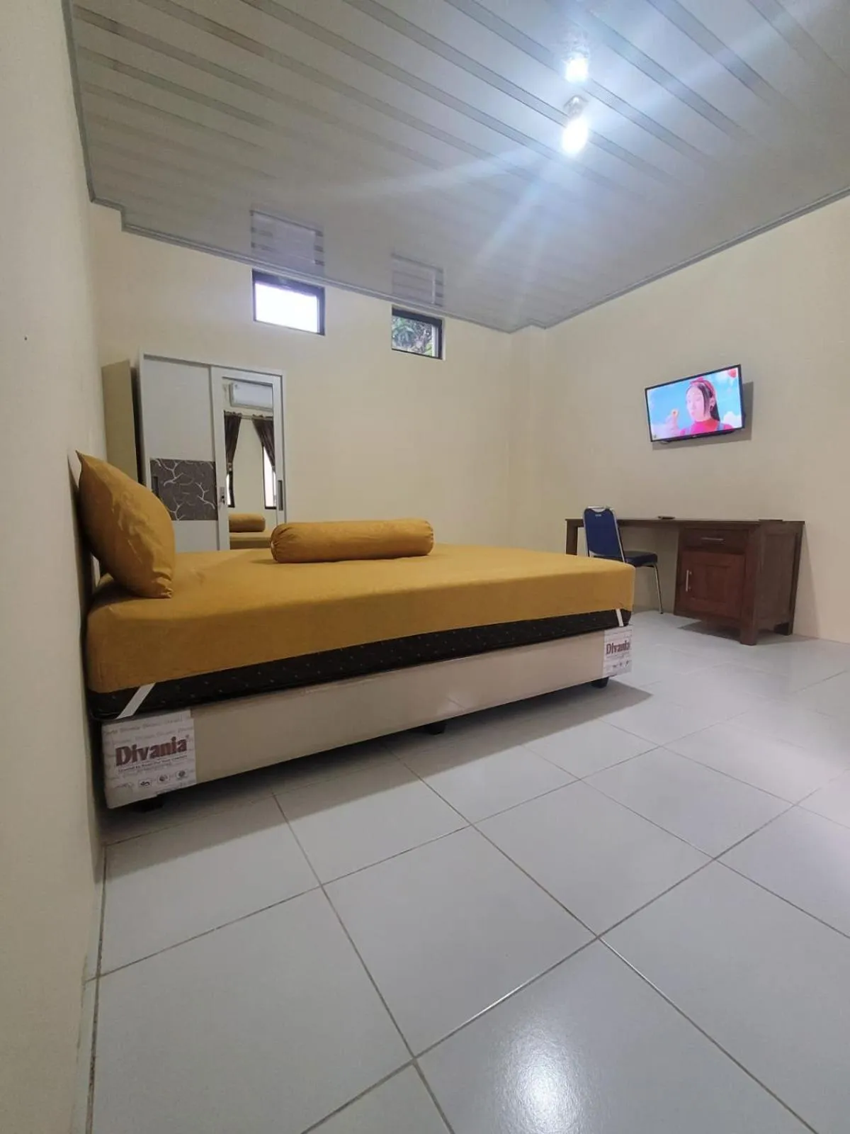 Bed in Solo Nadamax City Guest House Syariah