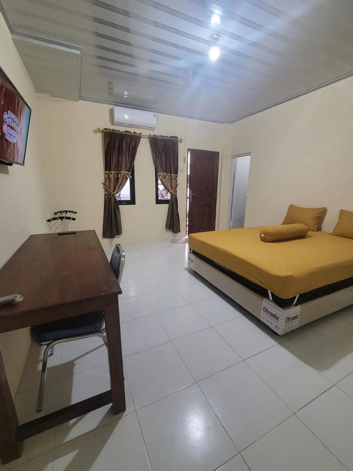 Bed in Solo Nadamax City Guest House Syariah