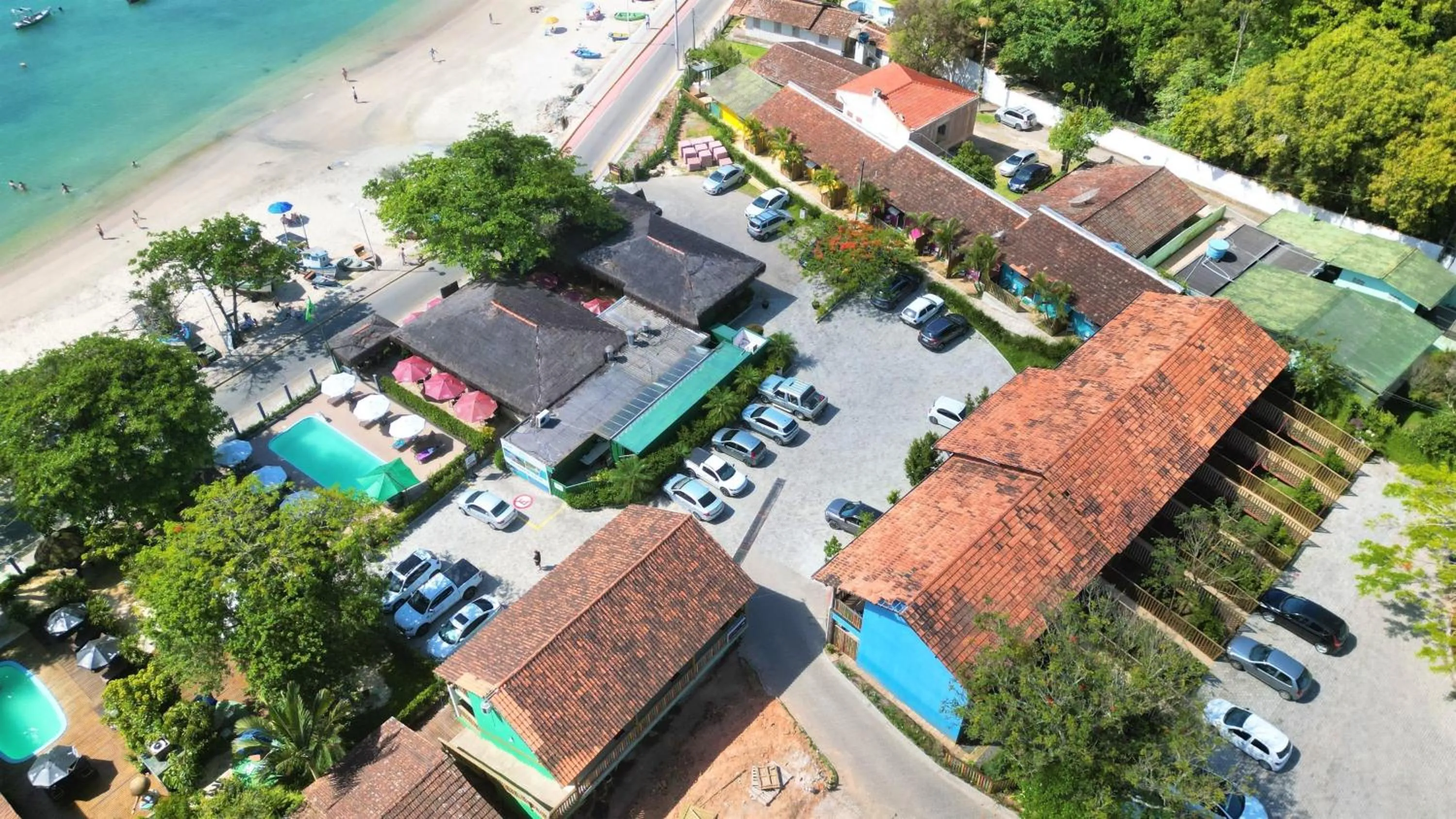 Communal lounge/ TV room in Hotel Pé na Areia