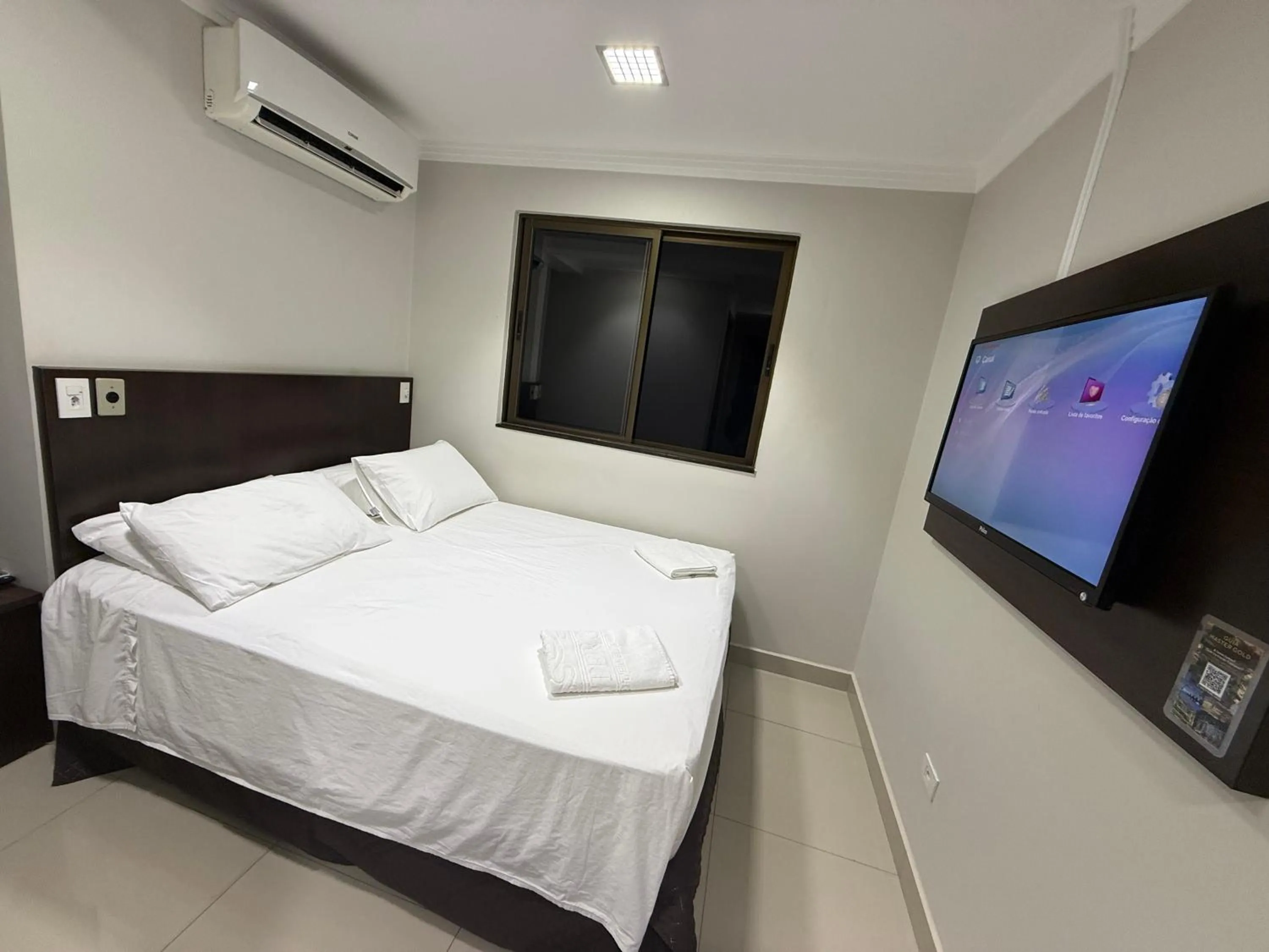 Bed in Master Gold Hotel Express