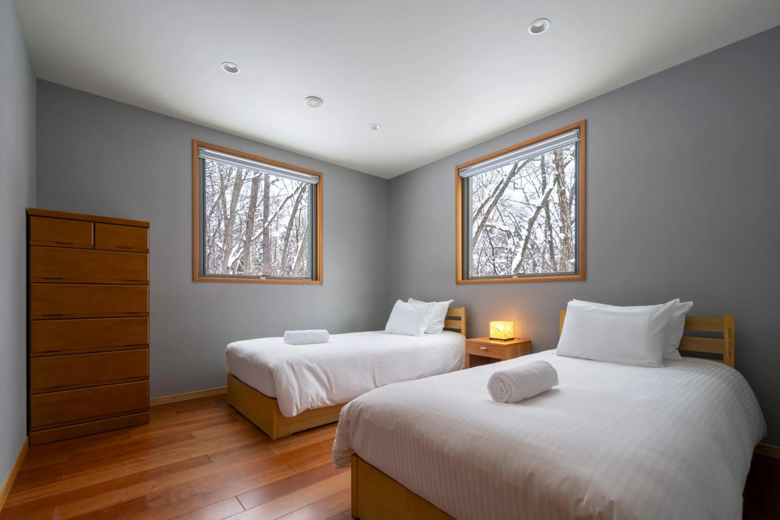 Bed in Bluebird Chalets by The Hakuba Collection