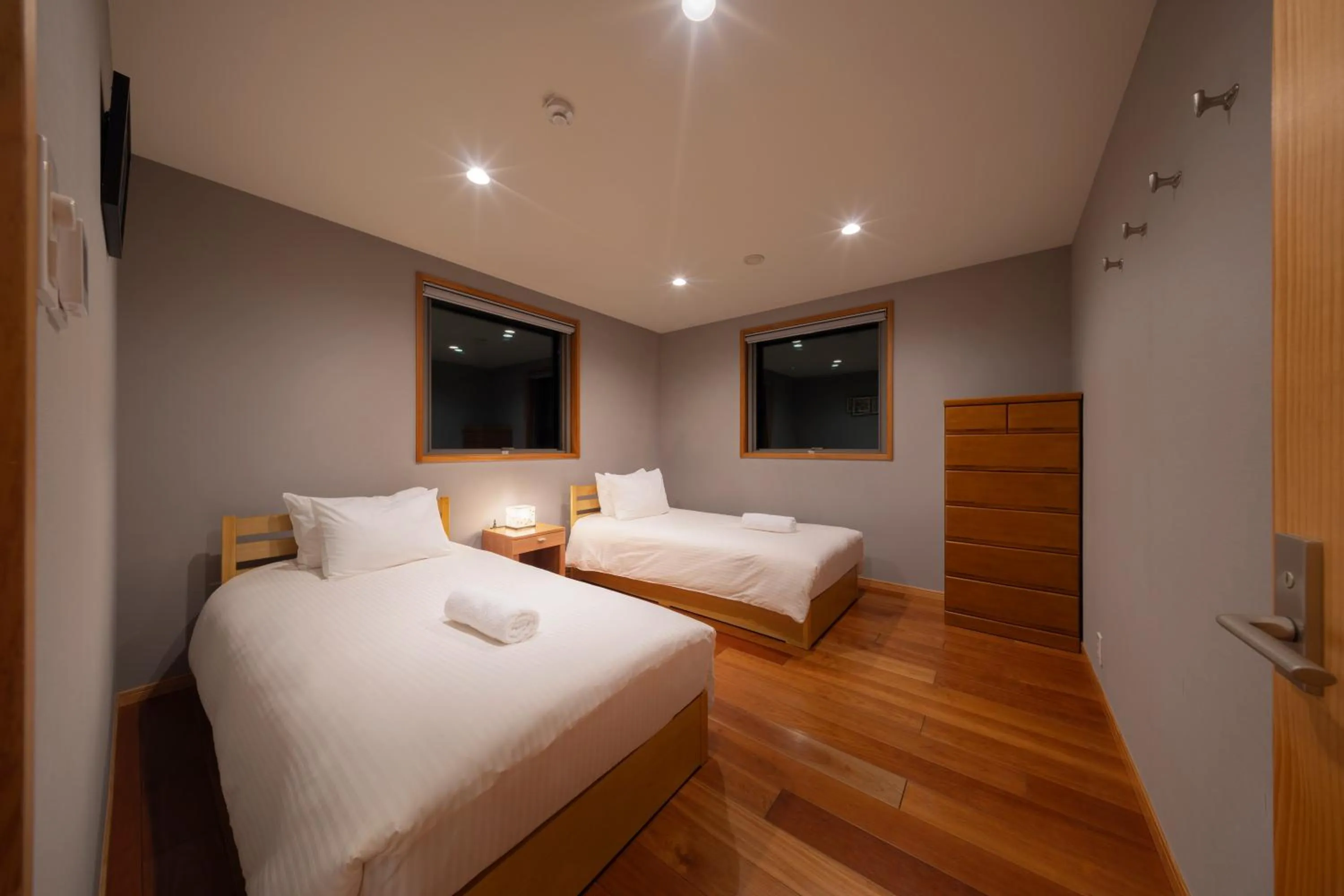 Bed in Bluebird Chalets by The Hakuba Collection