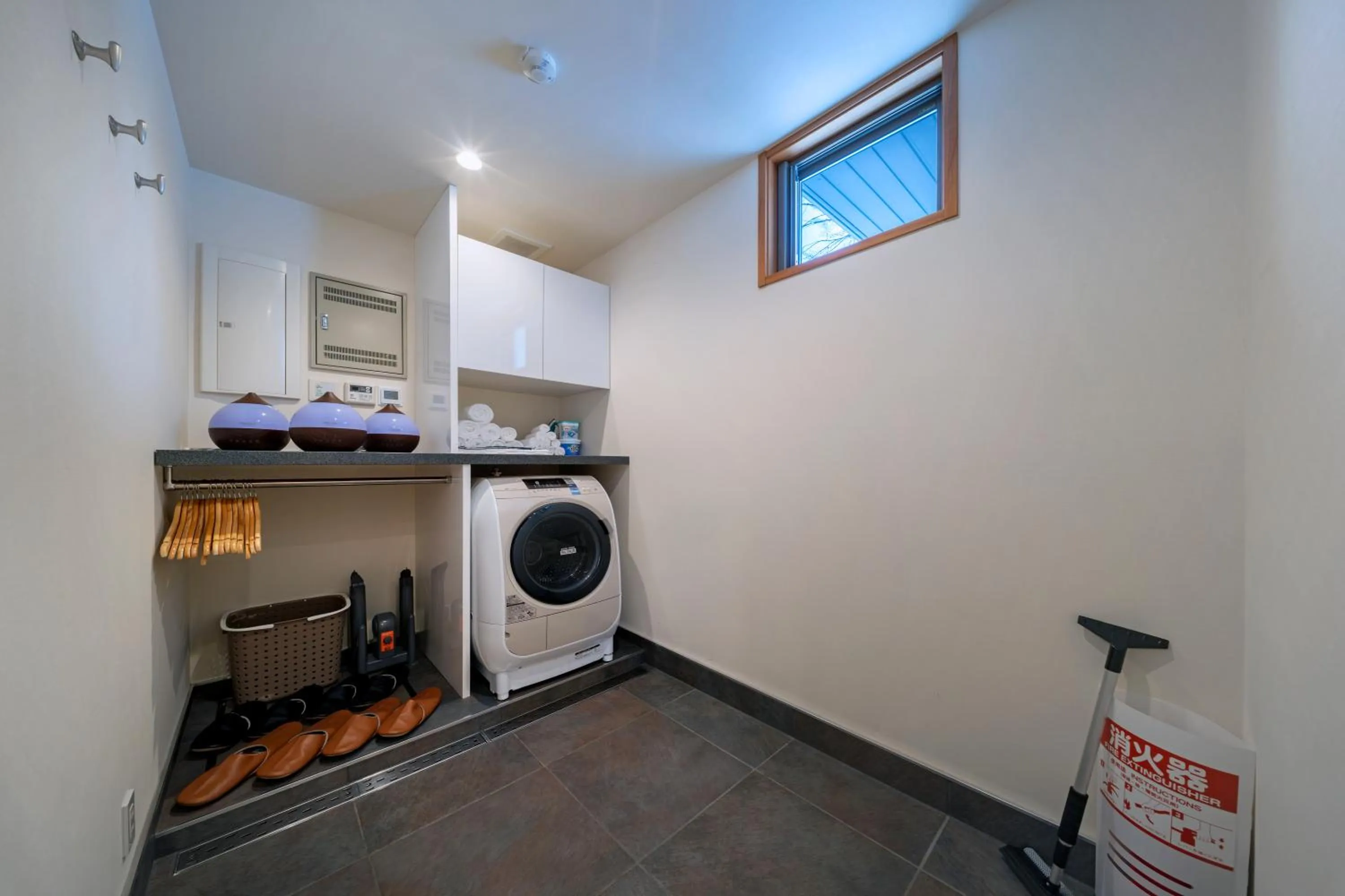 washing machine in Bluebird Chalets by The Hakuba Collection