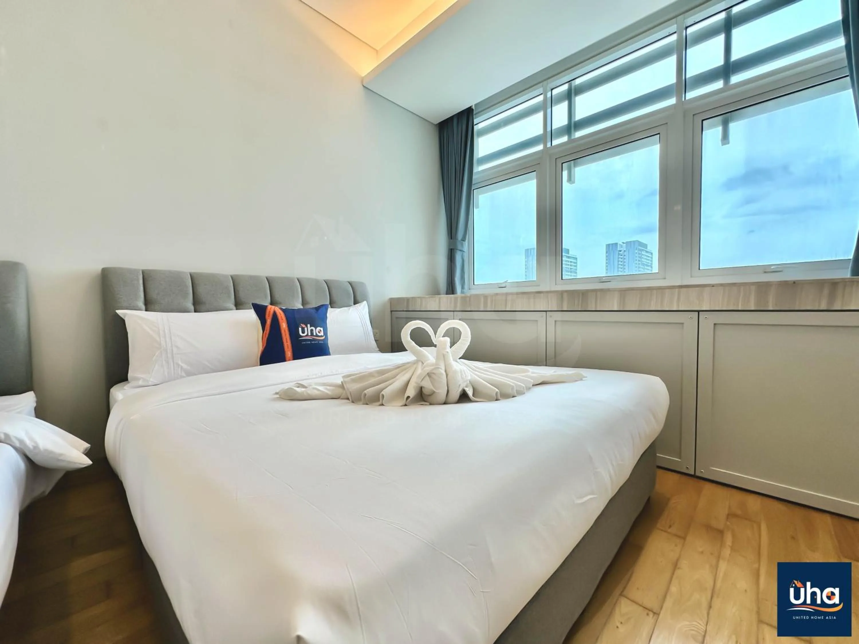 Bed in Pine Tree Suites by RR JBcity