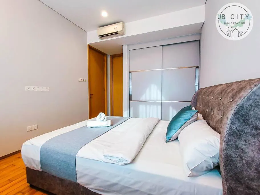 Bed in Pine Tree Suites by RR JBcity