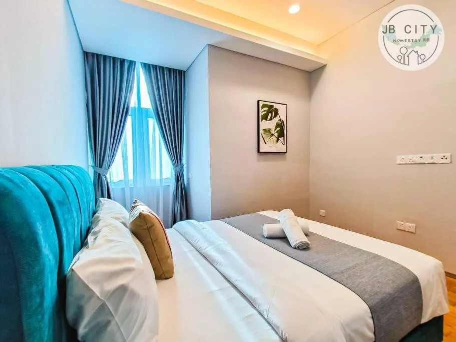 Bed in Pine Tree Suites by RR JBcity