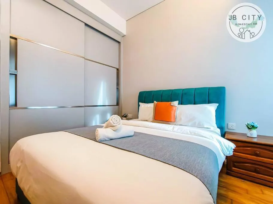 Bed in Pine Tree Suites by RR JBcity