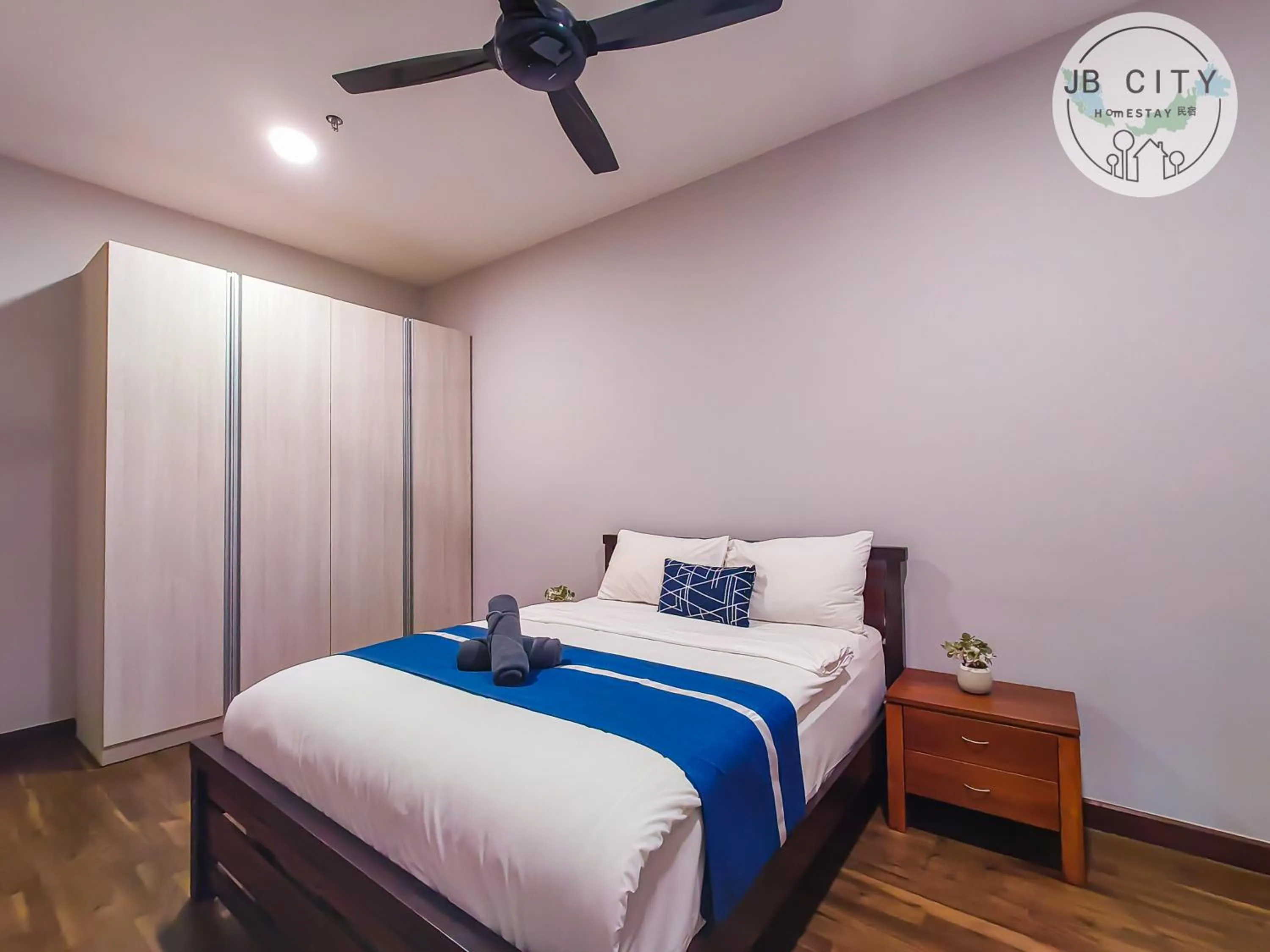 Bed in Pine Tree Suites by RR JBcity