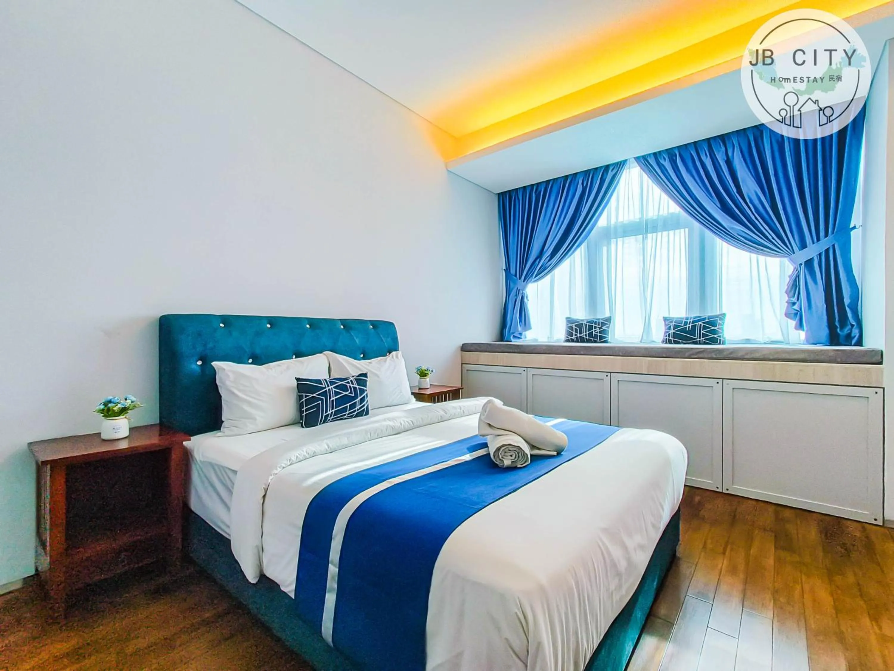 Bed in Pine Tree Suites by RR JBcity