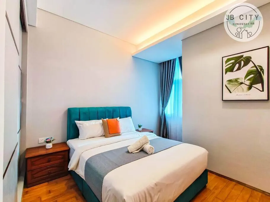 Bed in Pine Tree Suites by RR JBcity