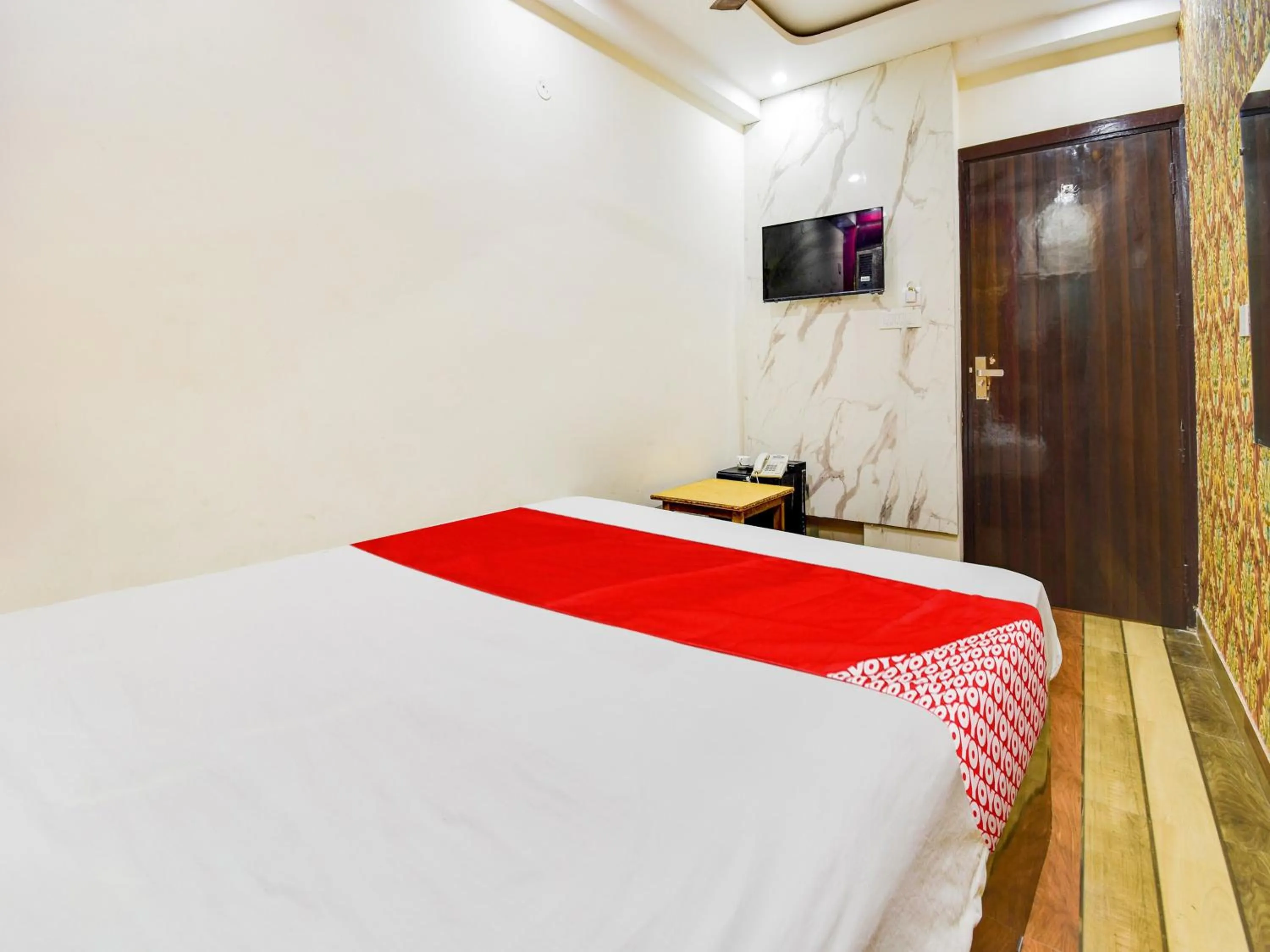 Bedroom in Hotel O Double RR