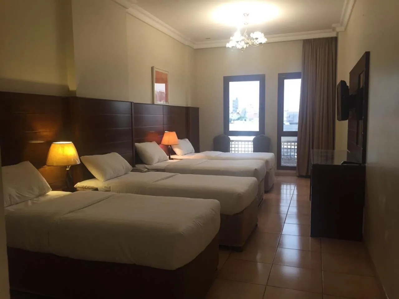 Bed in Manazel Alaswaf Hotel