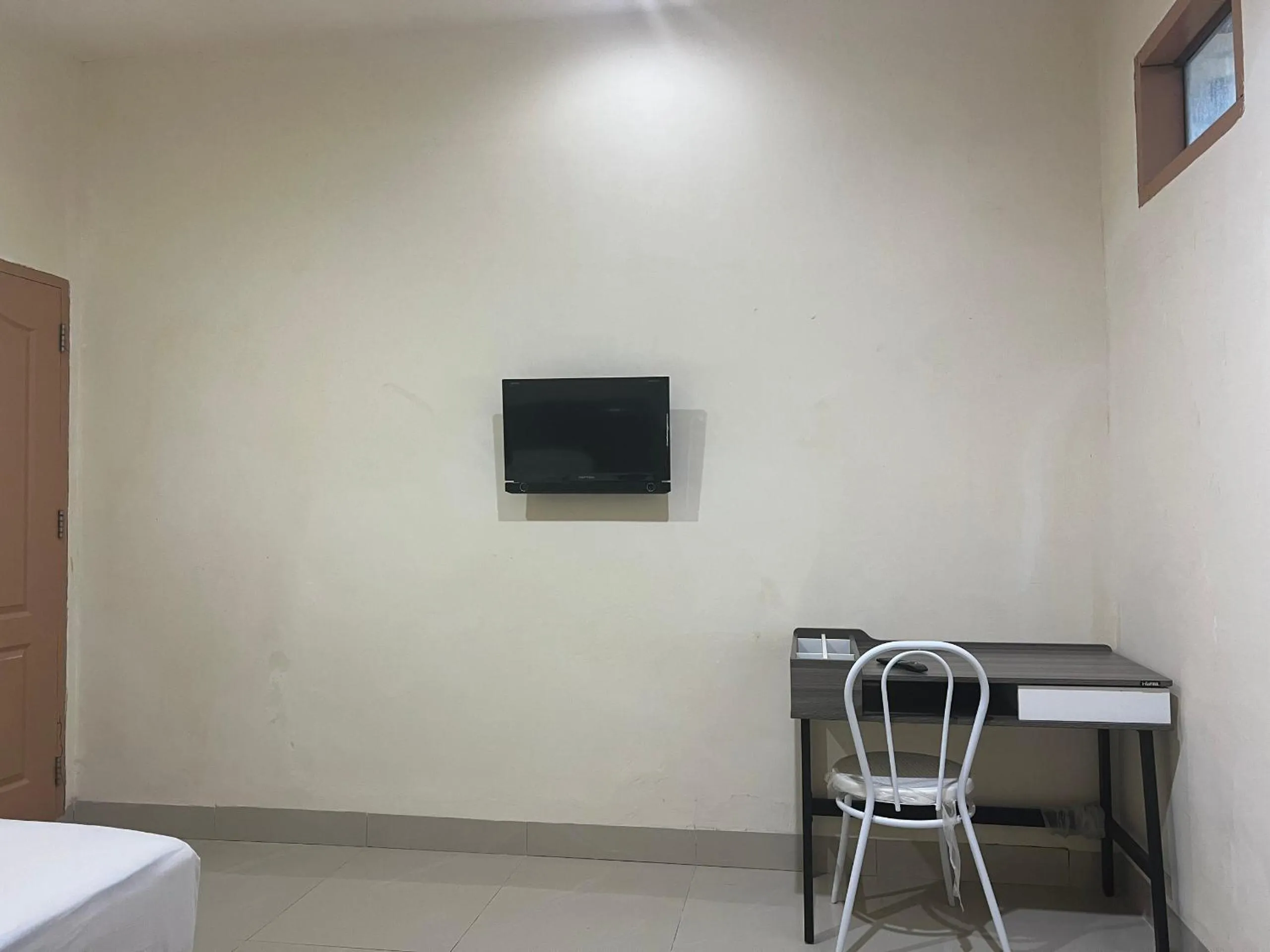 Bedroom in Hotel O Wisma Aliyah Near Sidrap