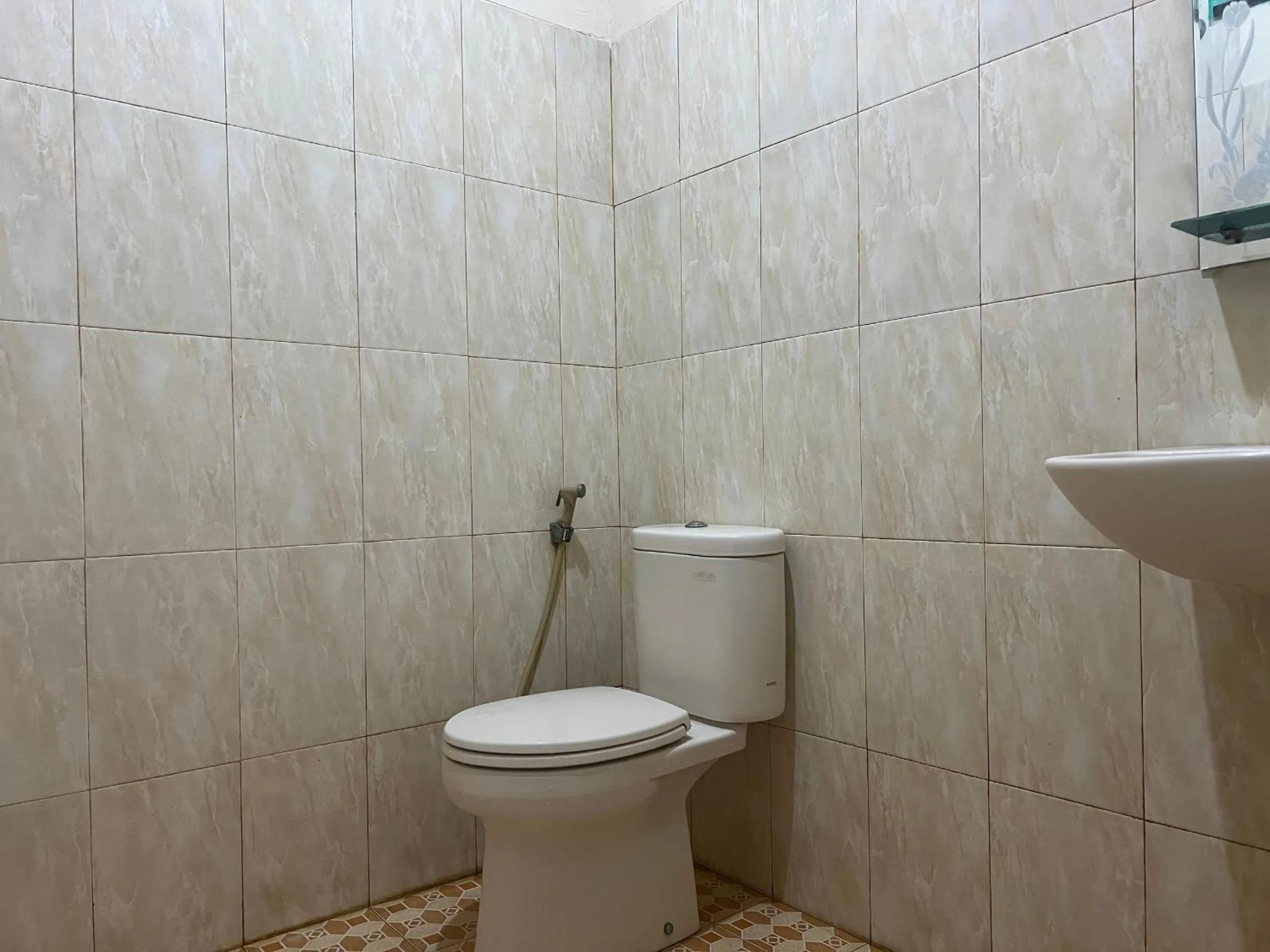 Bedroom in Hotel O Wisma Aliyah Near Sidrap