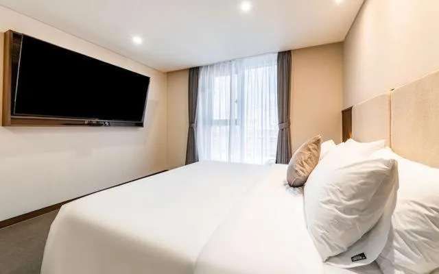 Photo of the whole room, Bed in Hound Hotel Gijang Osiria