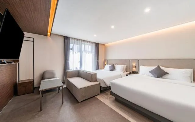 Photo of the whole room, Bed in Hound Hotel Gijang Osiria