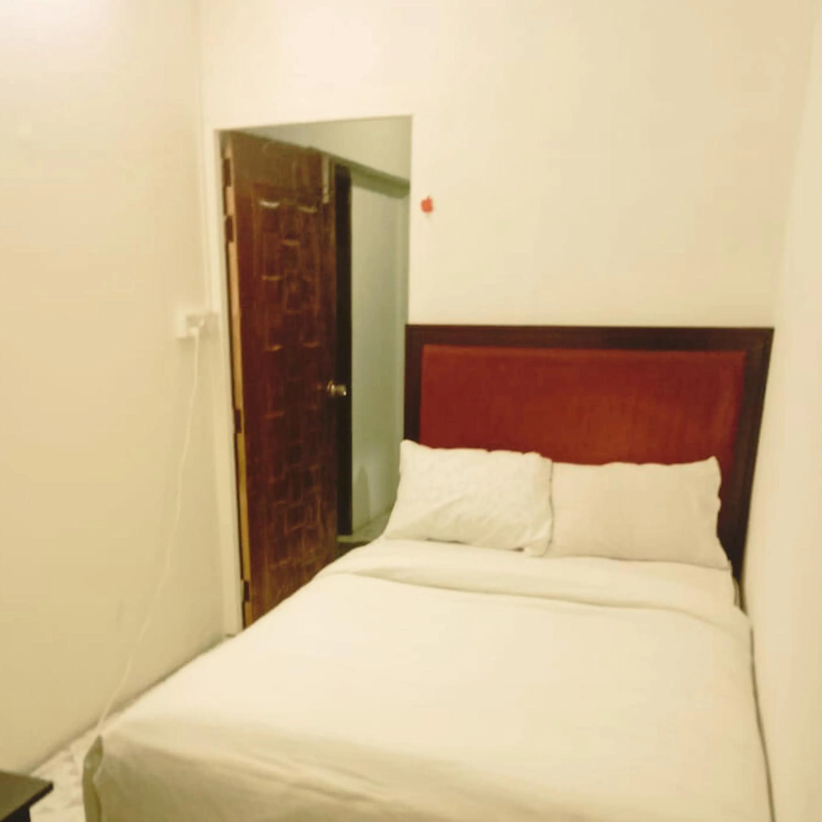 Bed in Hotel Golden Bird