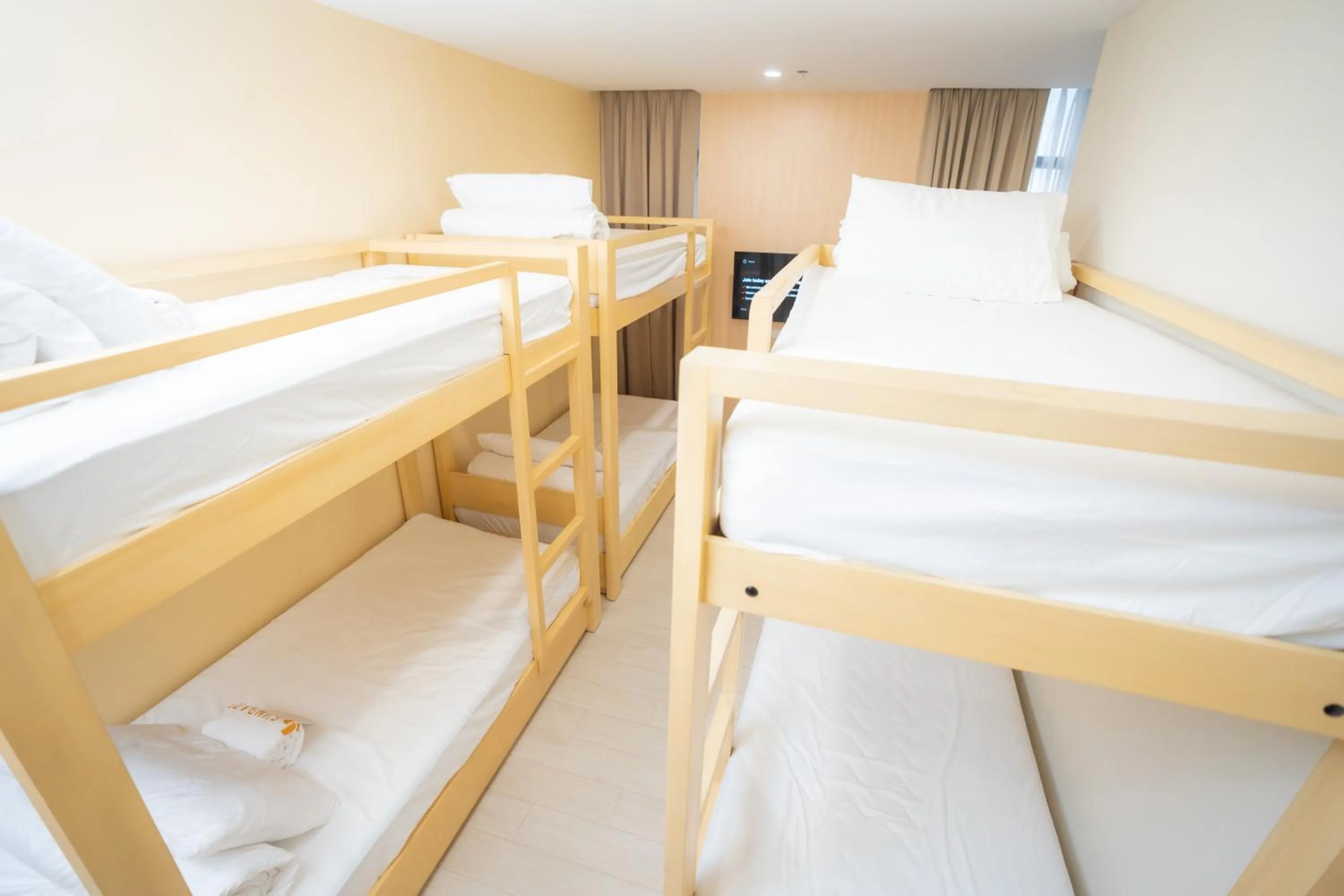 Bed in Sundaze Dormitel