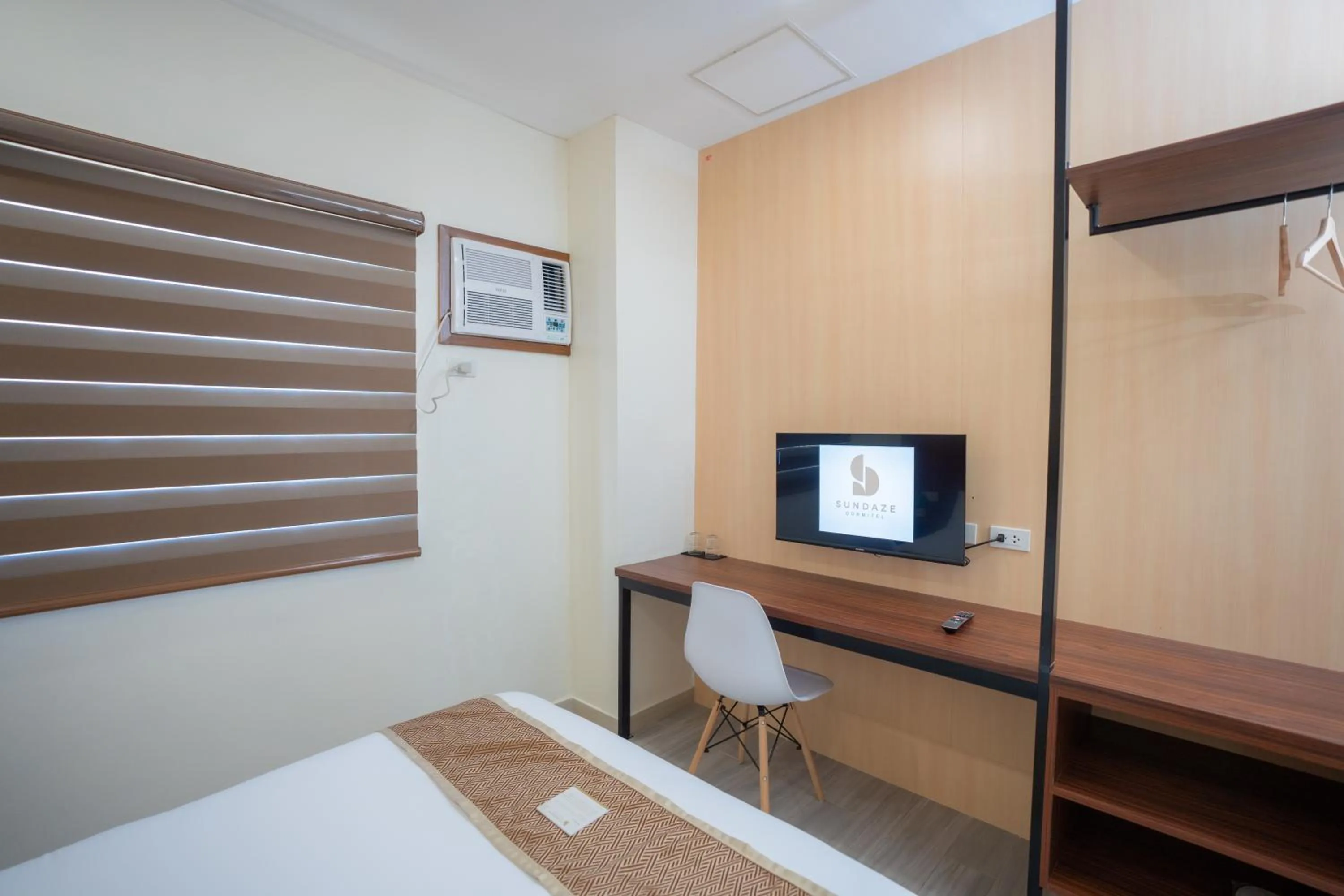 Bed in Sundaze Dormitel