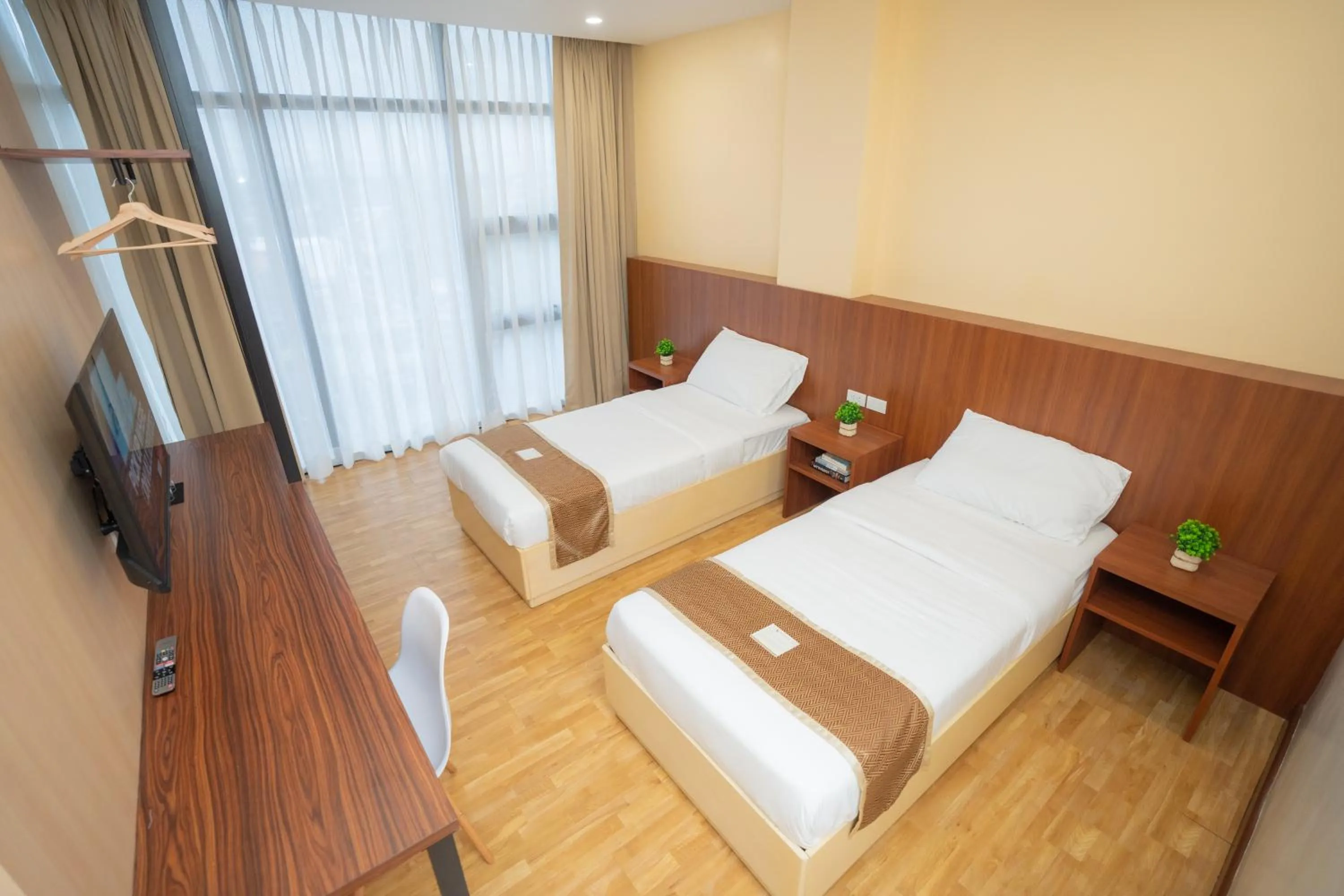 Bed in Sundaze Dormitel