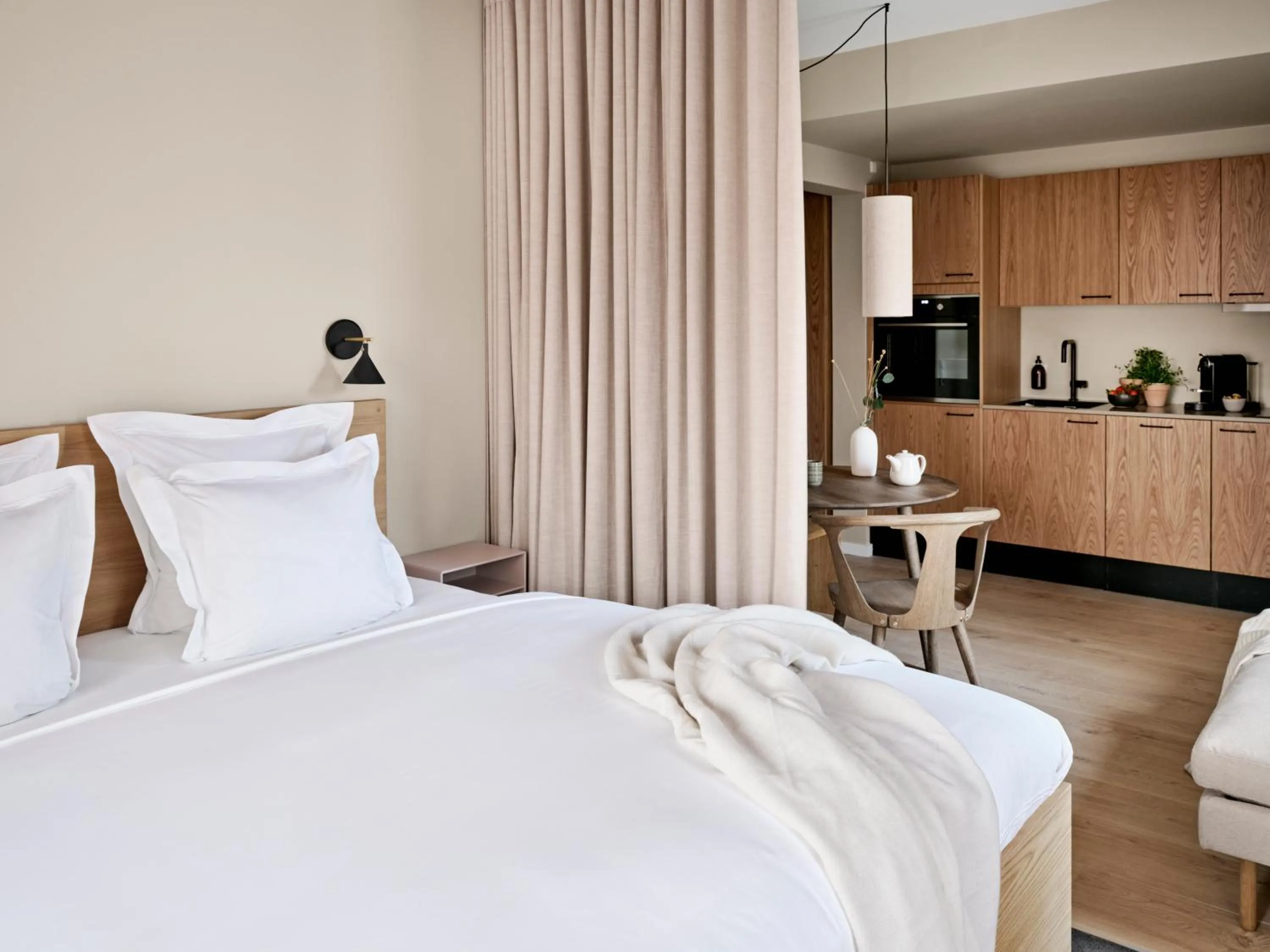 Bed in Aura Apartment Hotel