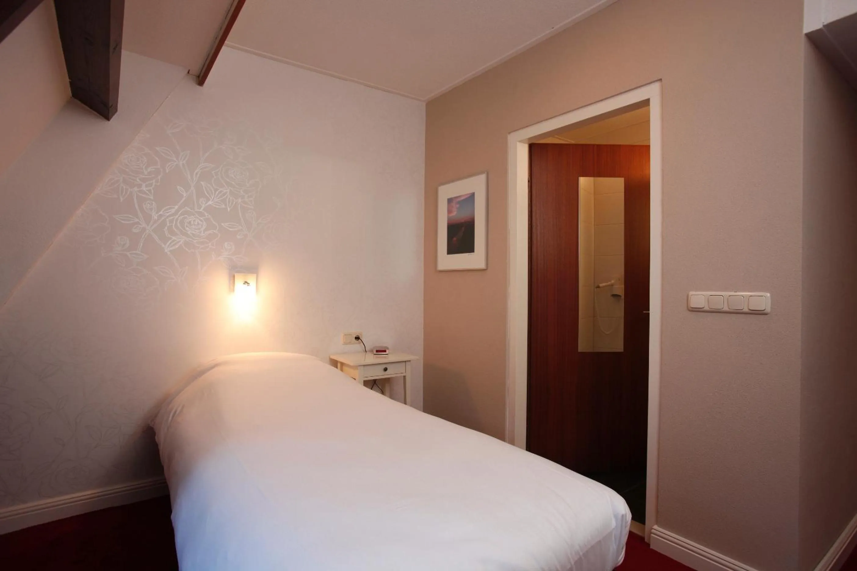 Bed in Hotel Restaurant Riche