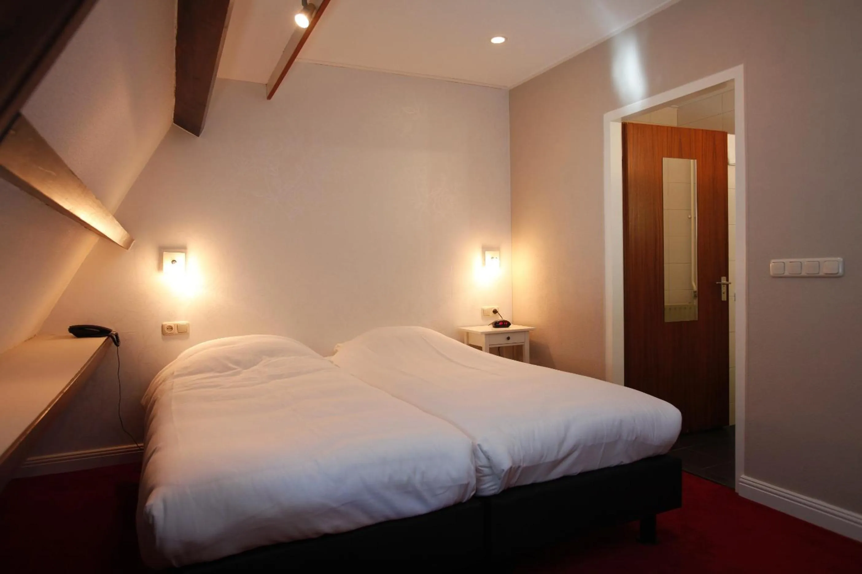 Bed in Hotel Restaurant Riche