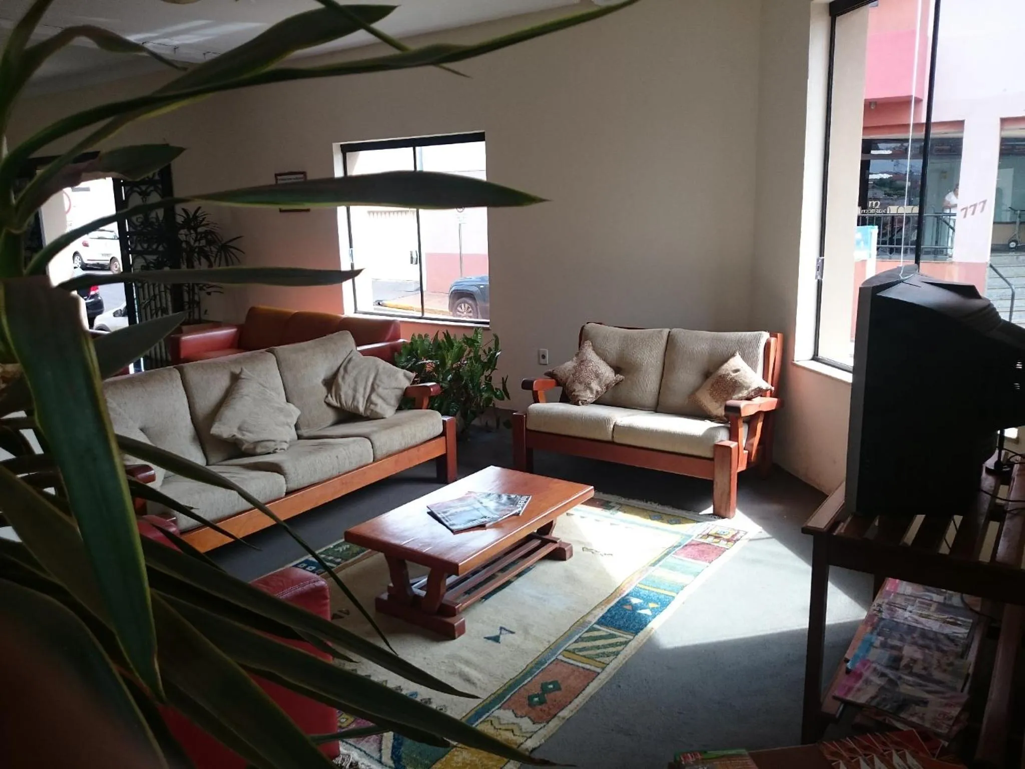 Communal lounge/ TV room in Scala Hotel Barretos