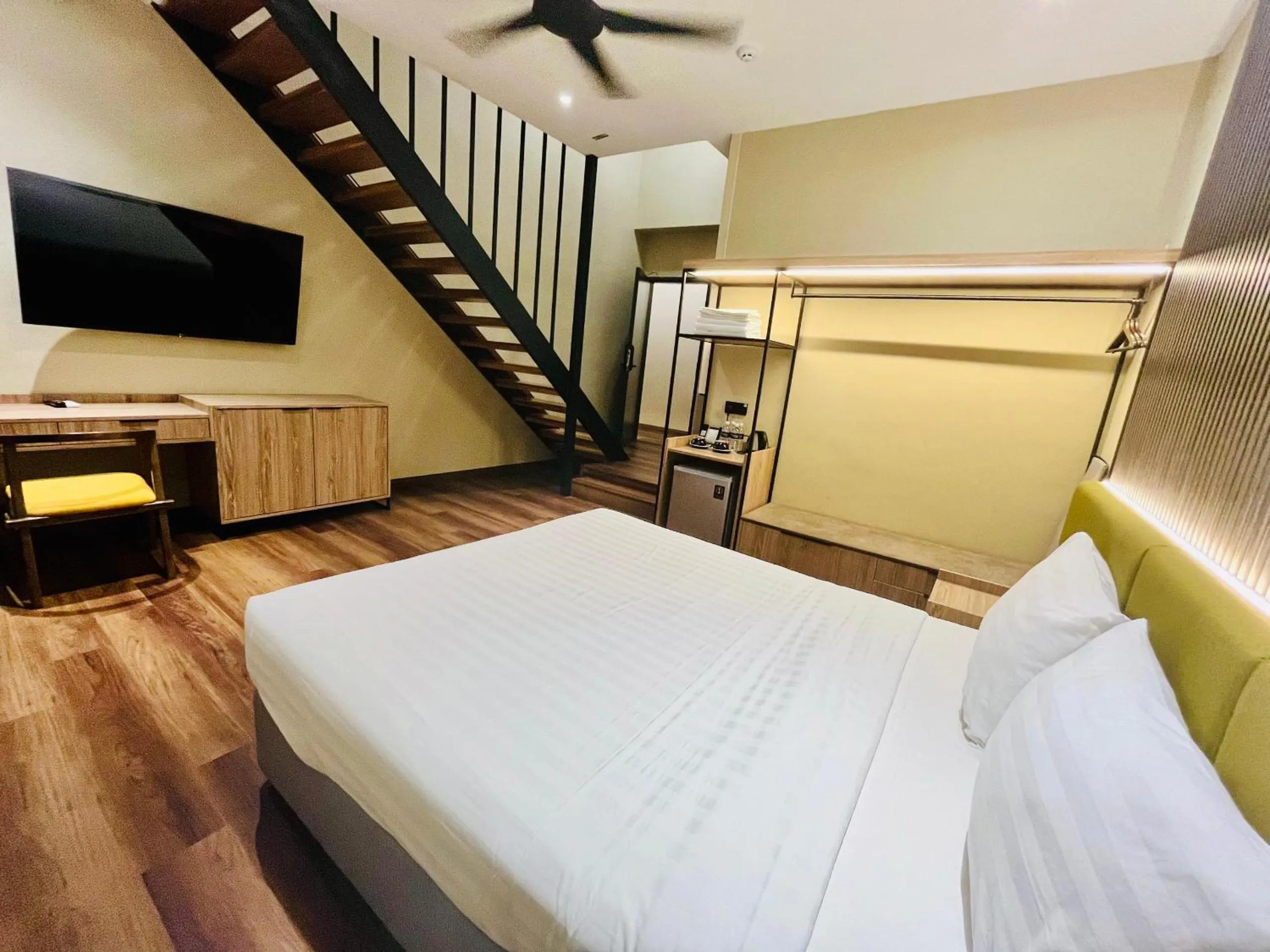 Bed in I-VISTA HOTEL