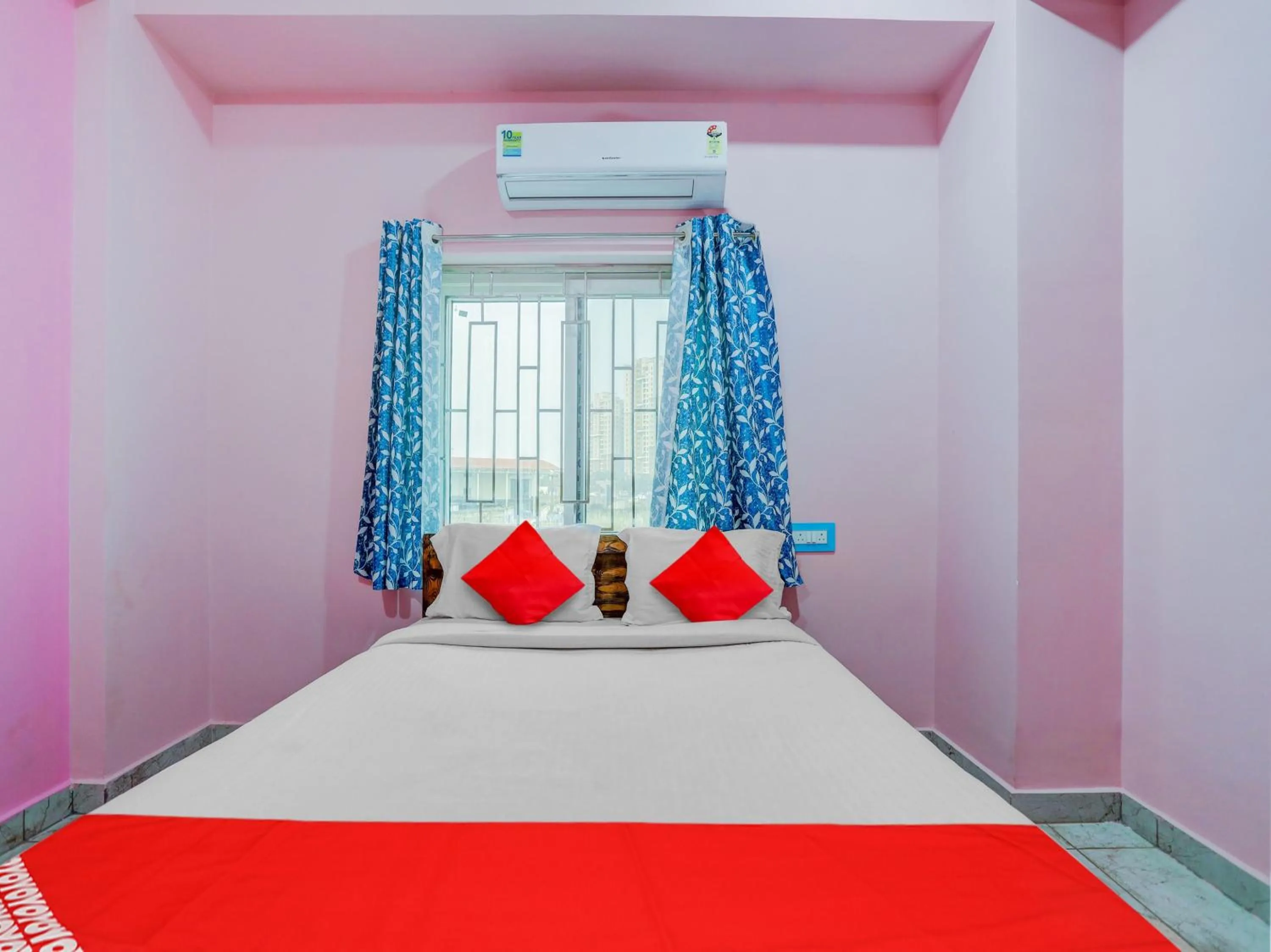 Bedroom in Hotel O Kalinga Inn