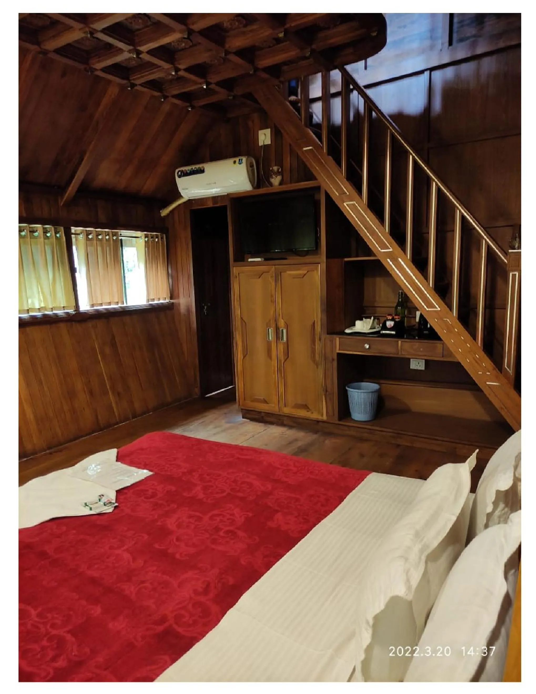 Photo of the whole room, Bed in Tree House Wayanad