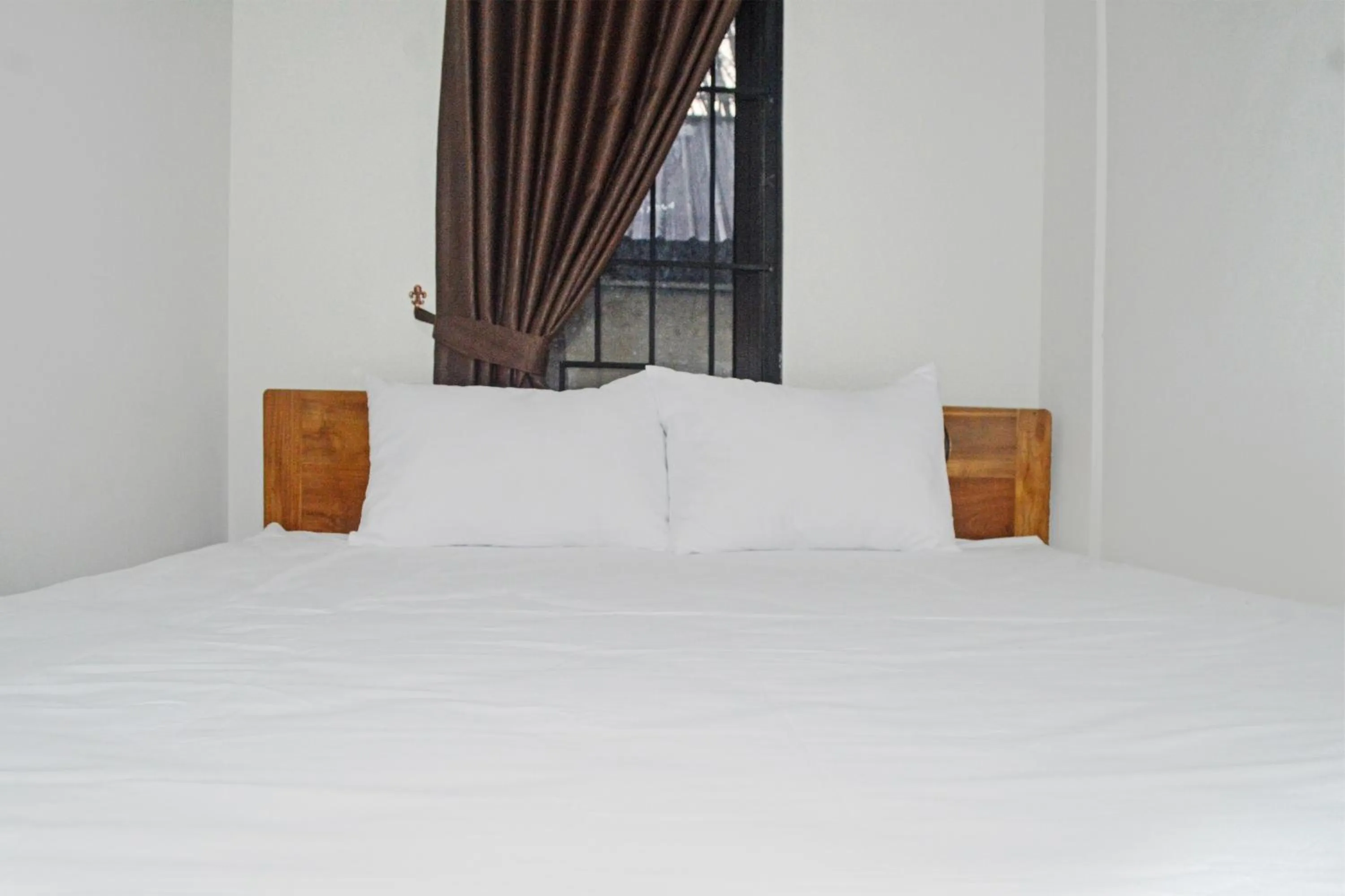 Bedroom in Super OYO 93085 Homy Stay Syariah